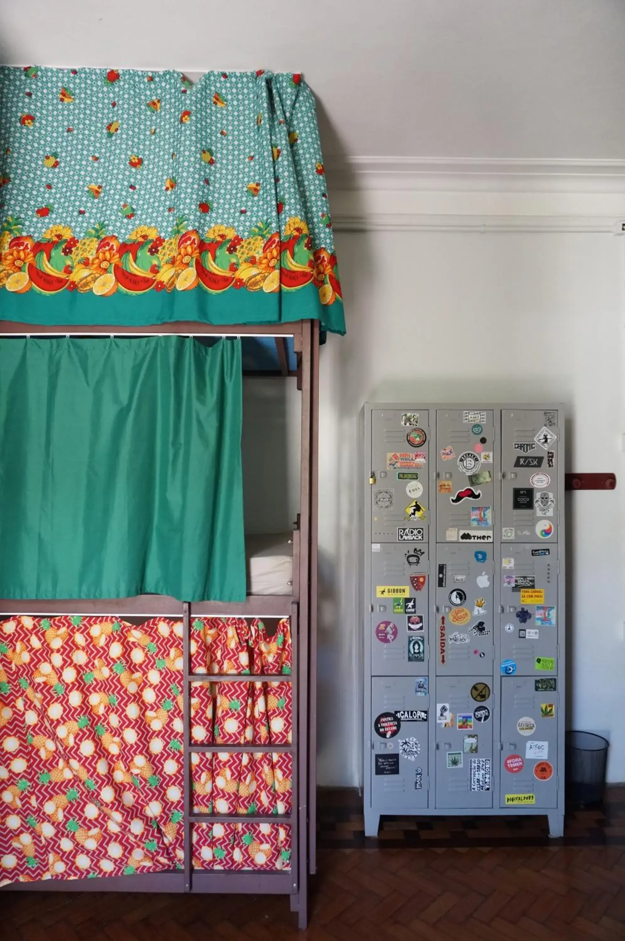 single bed in shared dormitory room with balcony in Mambembe Hostel single bed in shared dormitory room with balcony in Mambembe Hostel