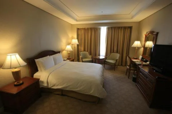 Bed in High1 Grand Hotel Main Tower