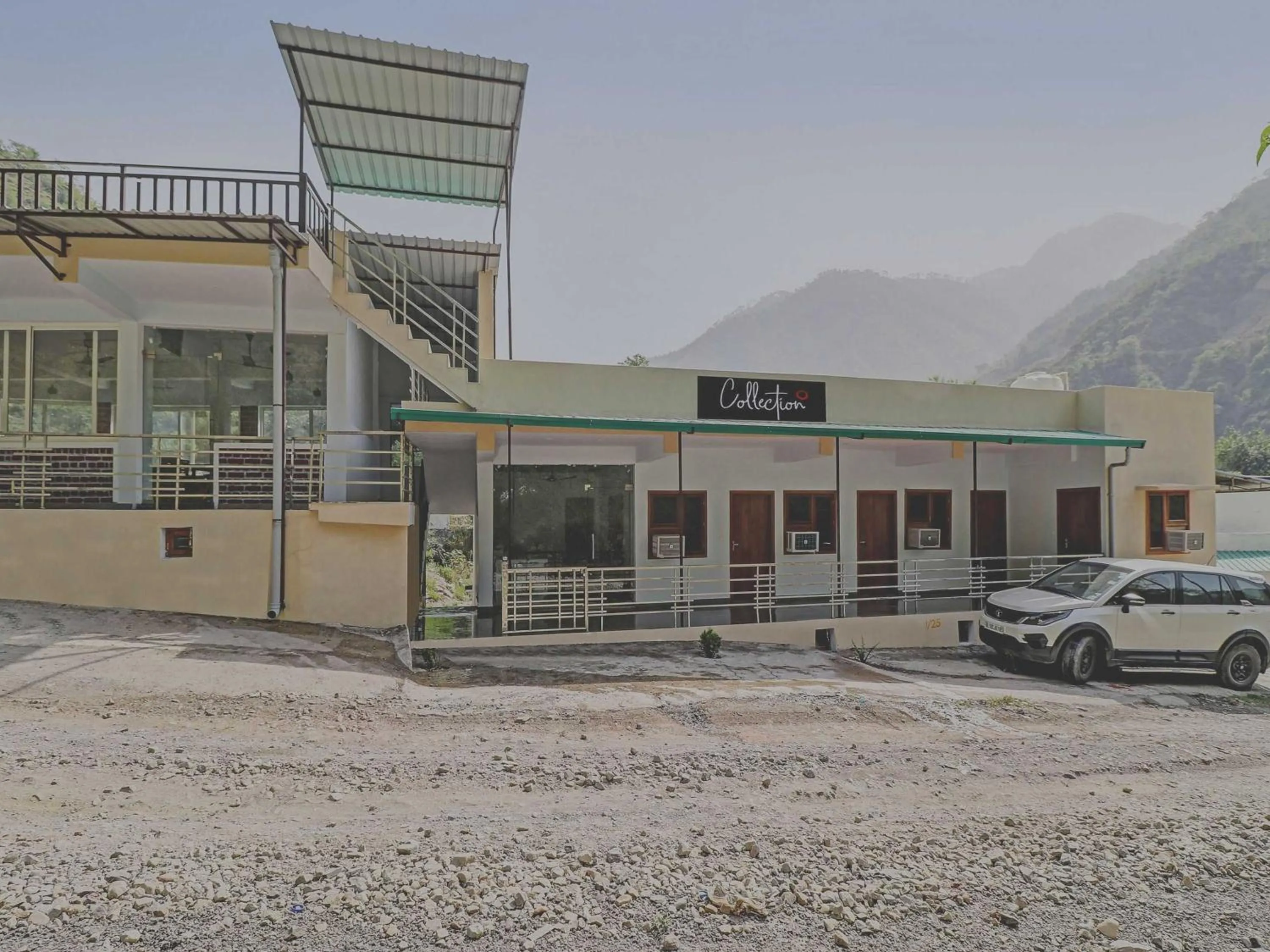 Facade/entrance in Collection O Studioz Om River Resort