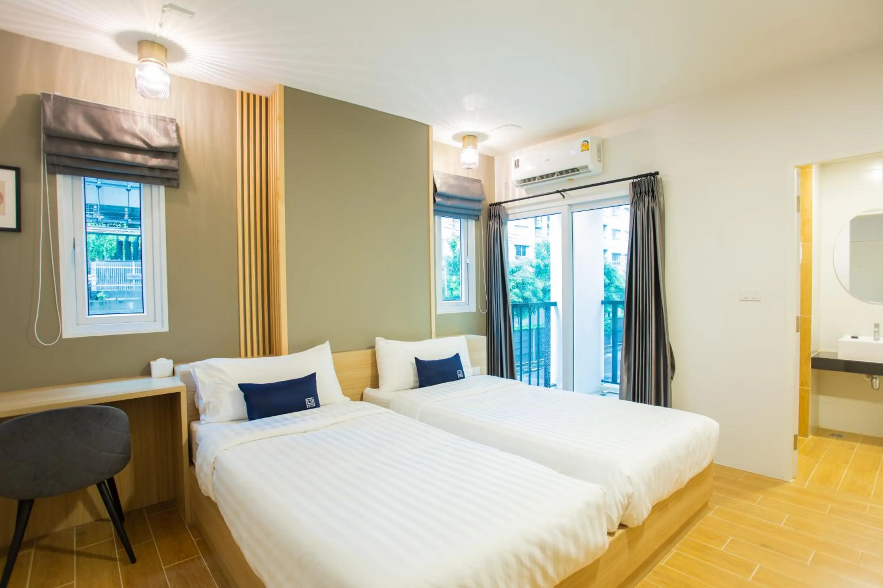 Bed in Zayn Express & Suites