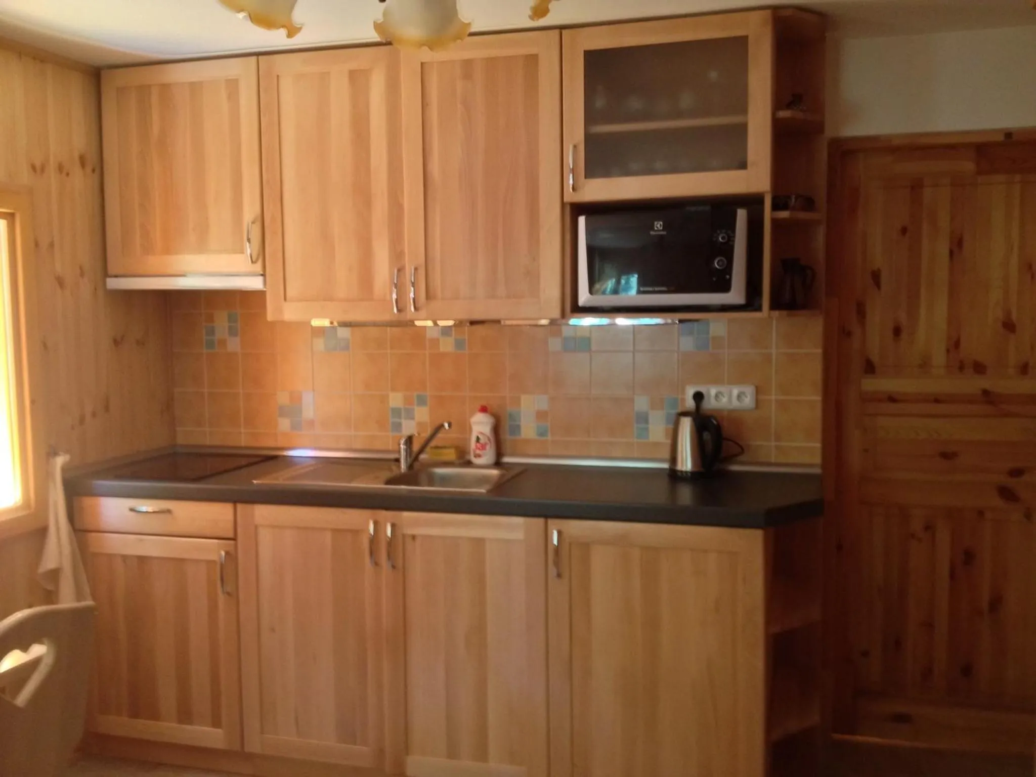 Kitchen or kitchenette in Chata Hokejka