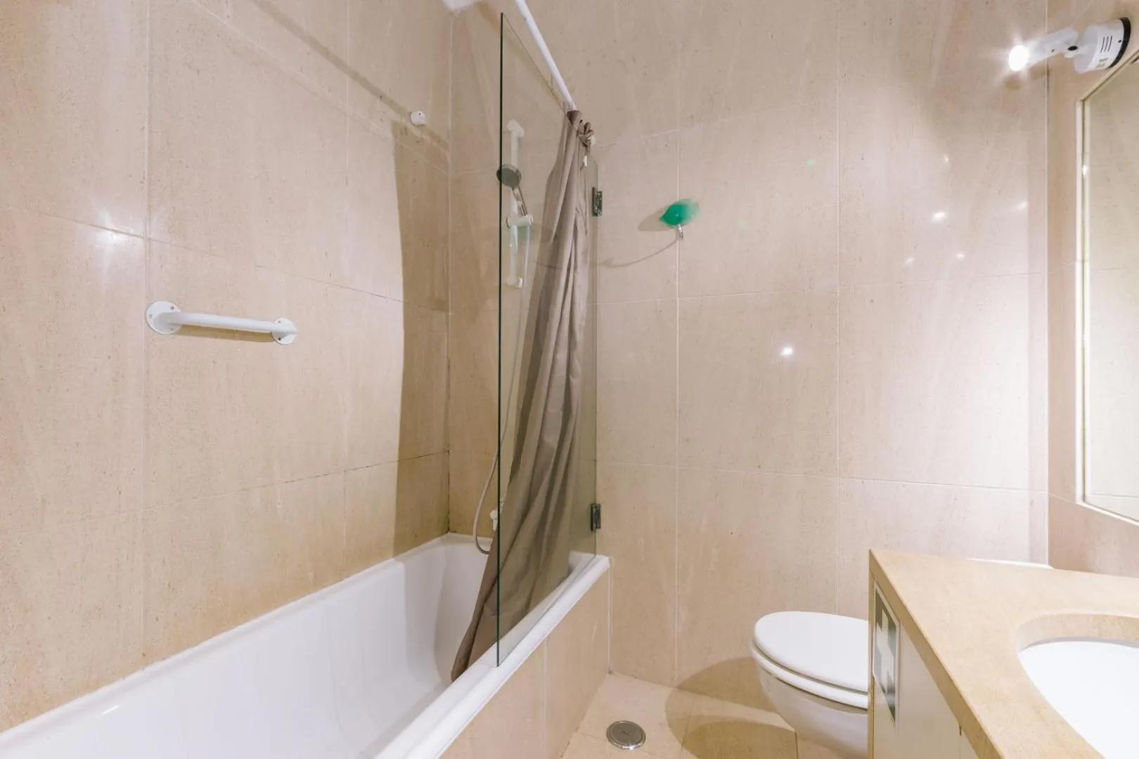 Shower in Rent4Rest Estoril Beachfront Apartments