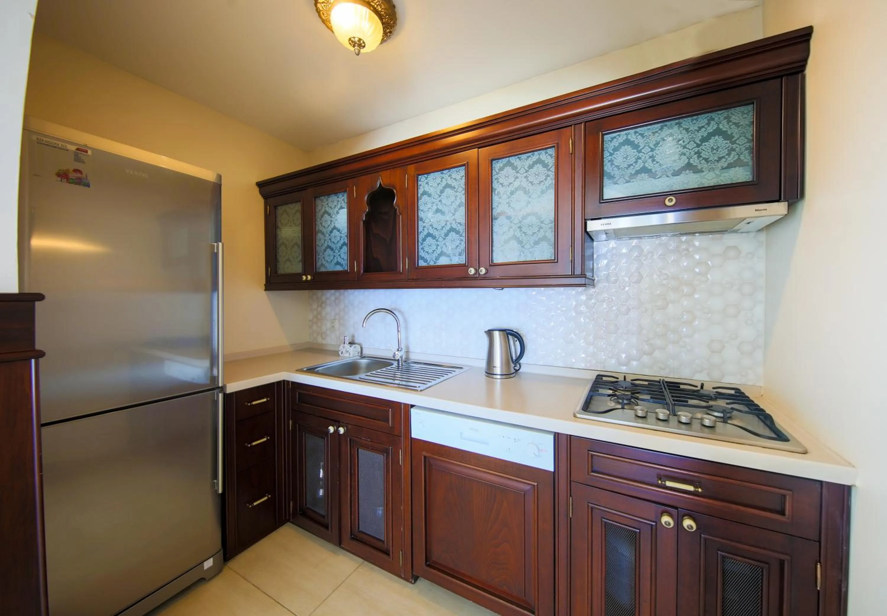 Kitchen or kitchenette in Salmakis Resort & Spa