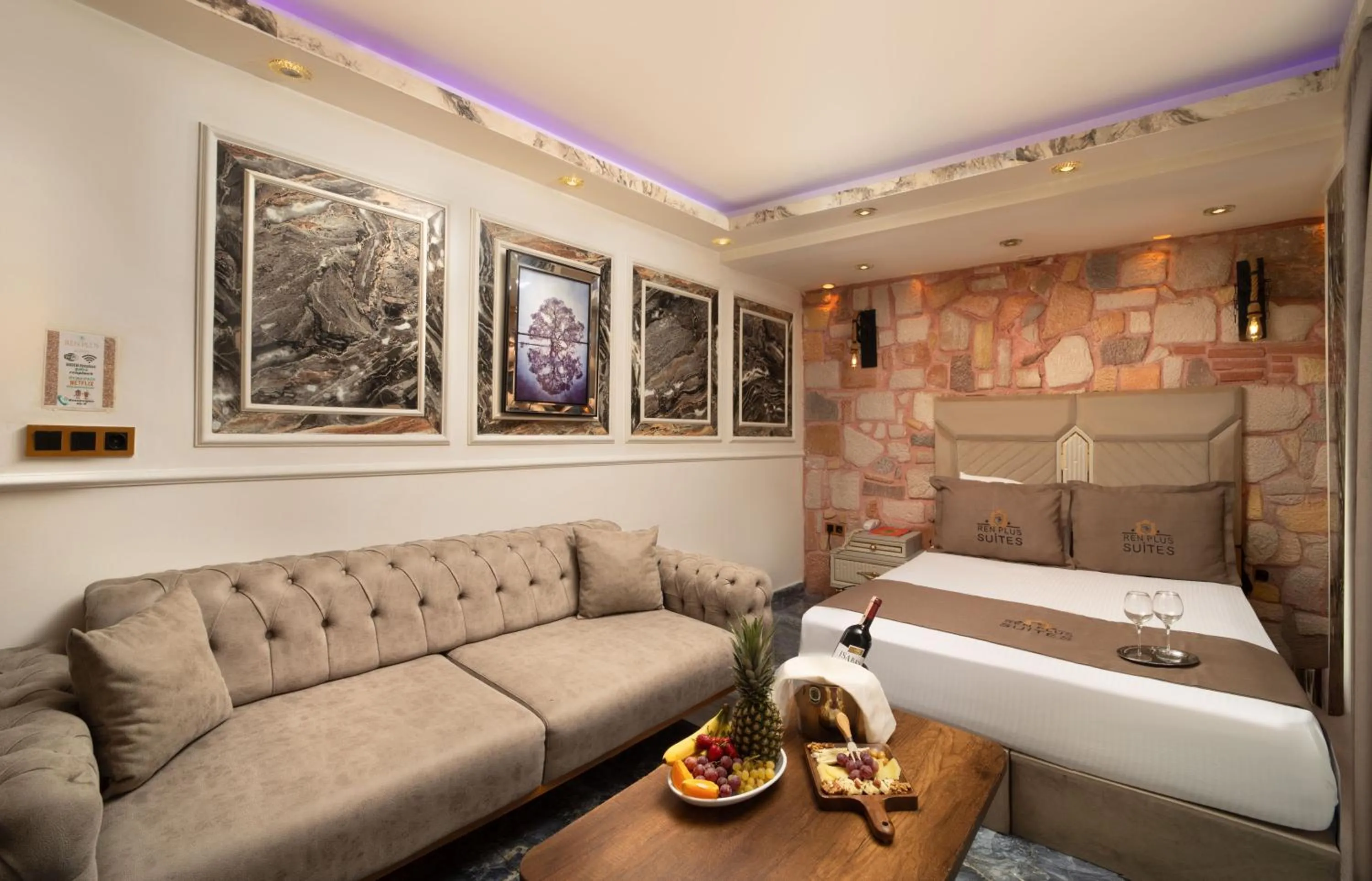 Bed in REN PLUS SUITES