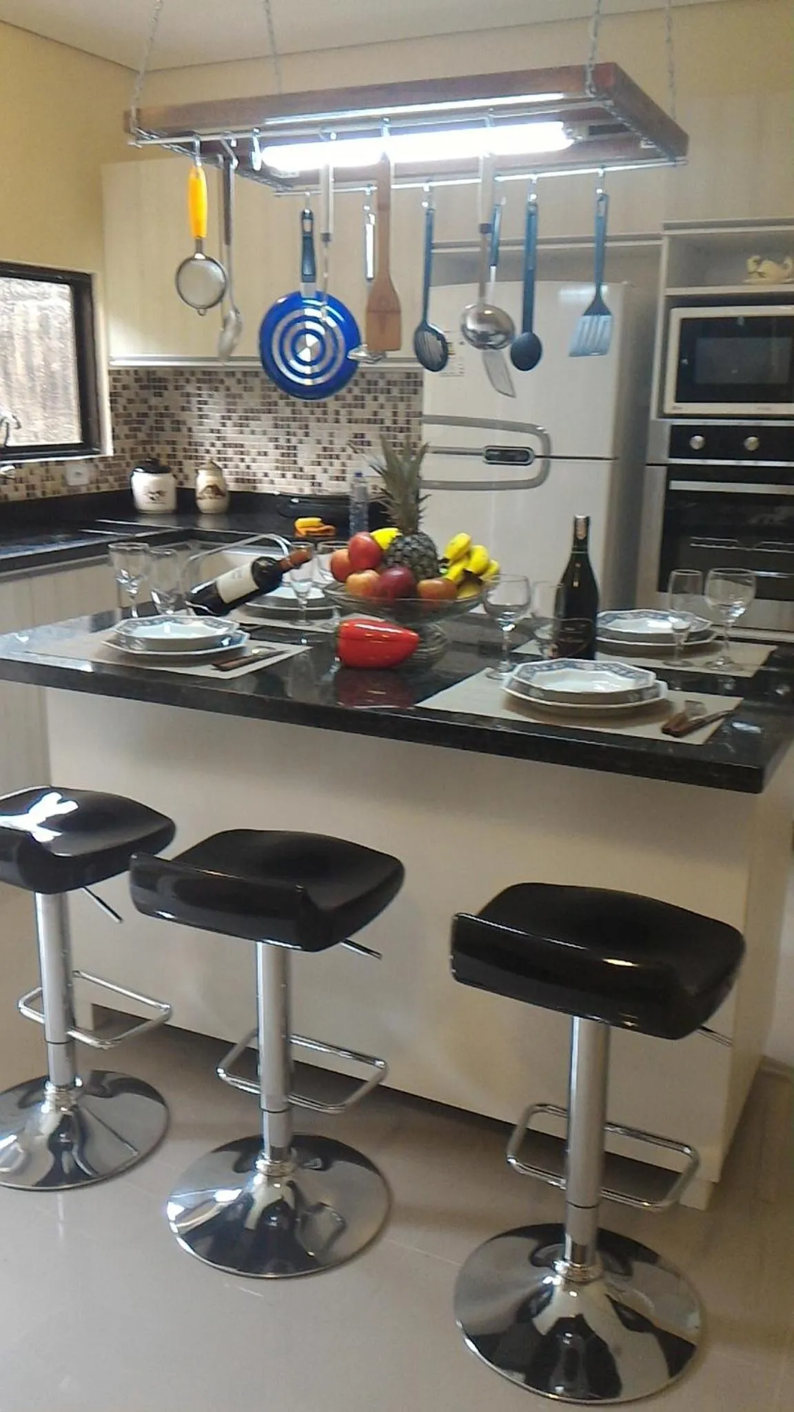 Kitchen or kitchenette in Pousada Porto Paraiso, o seu Paraíso Escondido no Guarujá