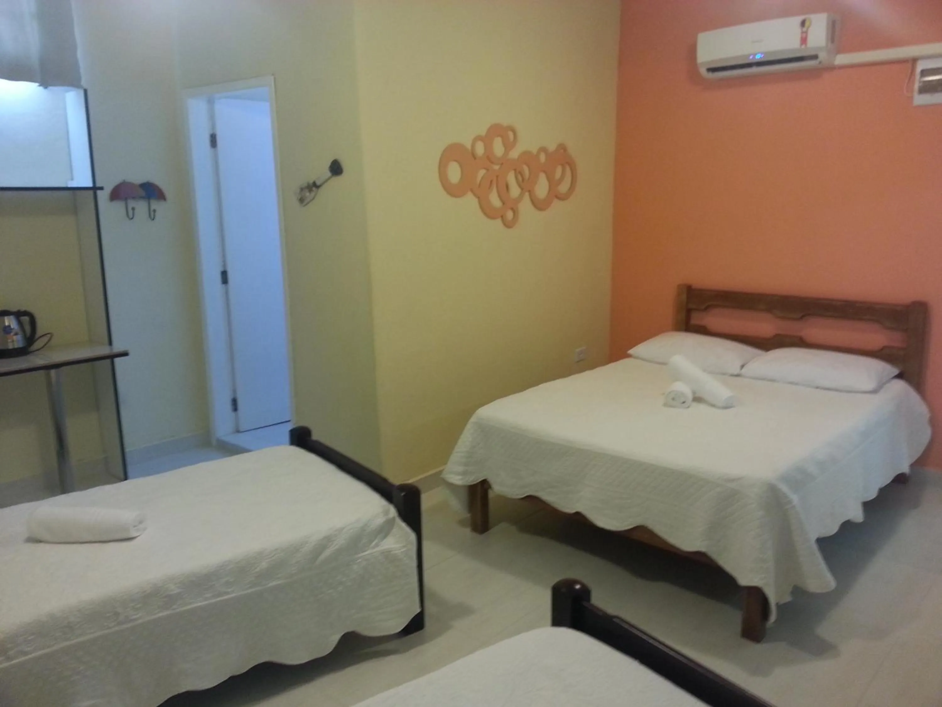 Photo of the whole room, Bed in Pousada Porto Paraiso, o seu Paraíso Escondido no Guarujá