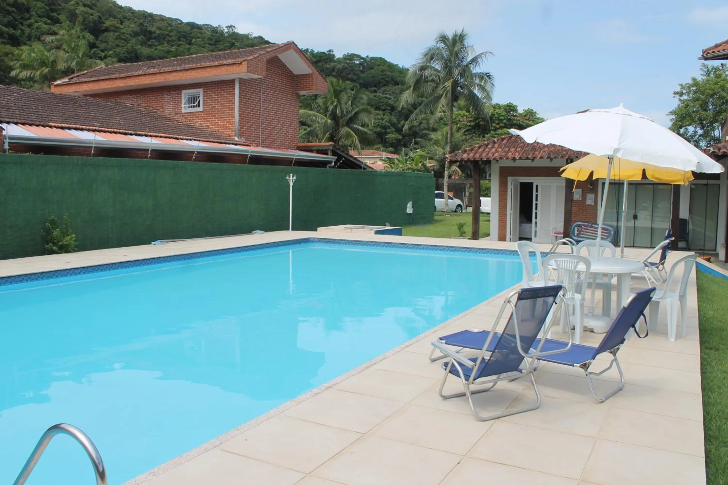 Swimming pool in Pousada Porto Paraiso, o seu Paraíso Escondido no Guarujá