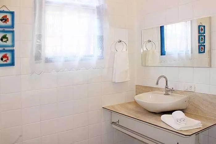 Bathroom in Pousada Porto Paraiso, o seu Paraíso Escondido no Guarujá