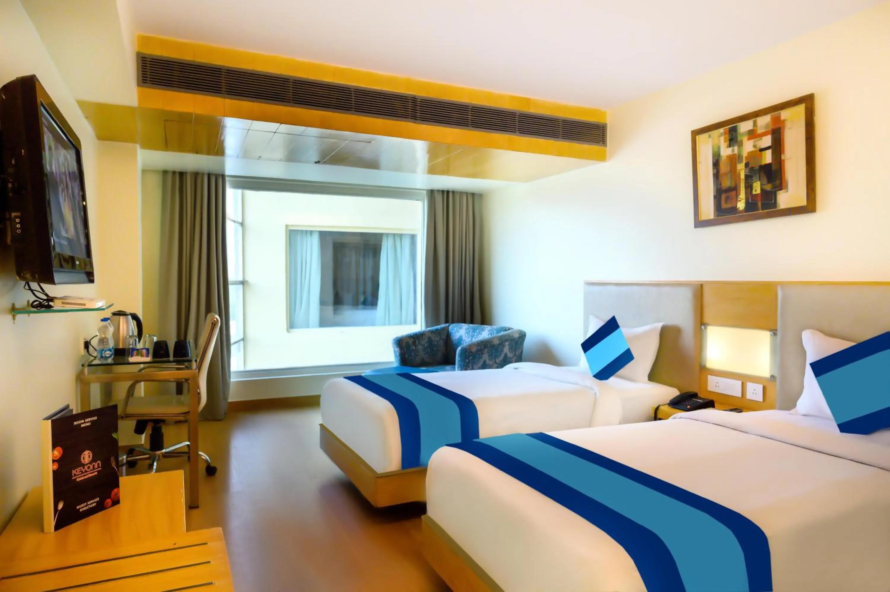 Communal lounge/ TV room, Bed in Keyon By Kumar