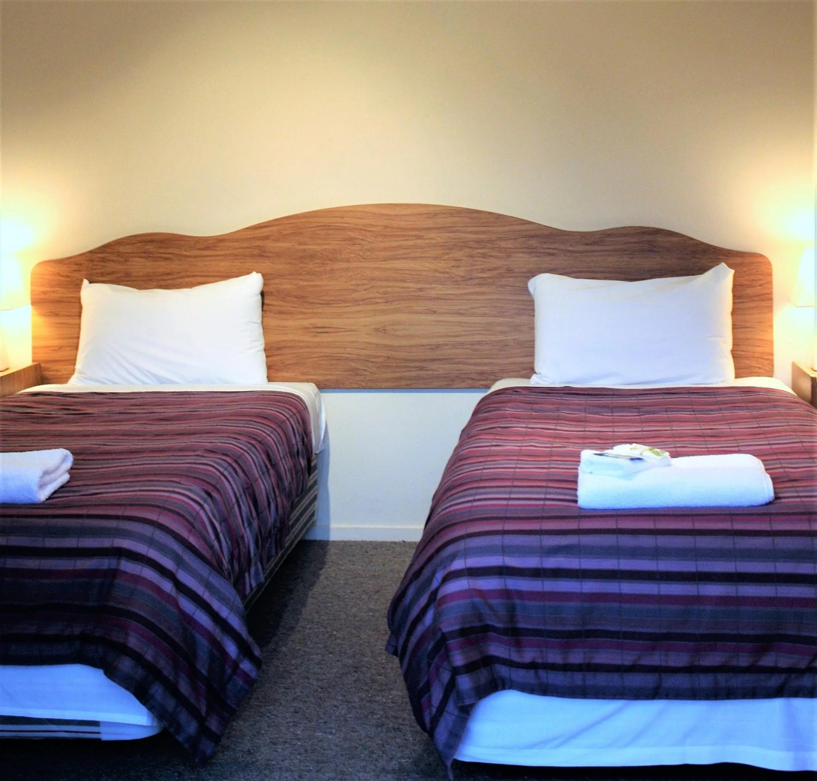 Bed in Owen River Tavern & Motels