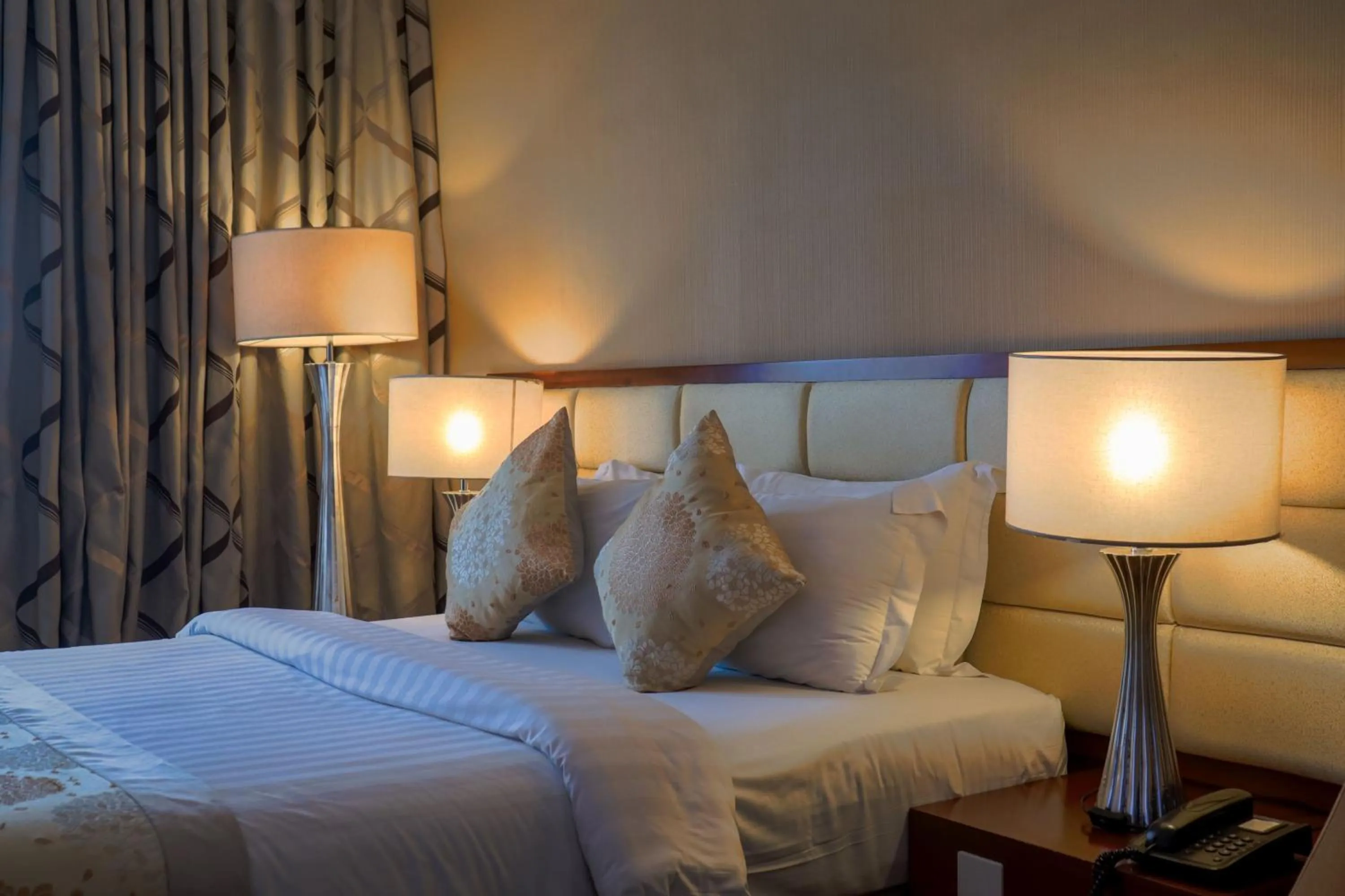 Bed in The Avenue Plaza Hotel