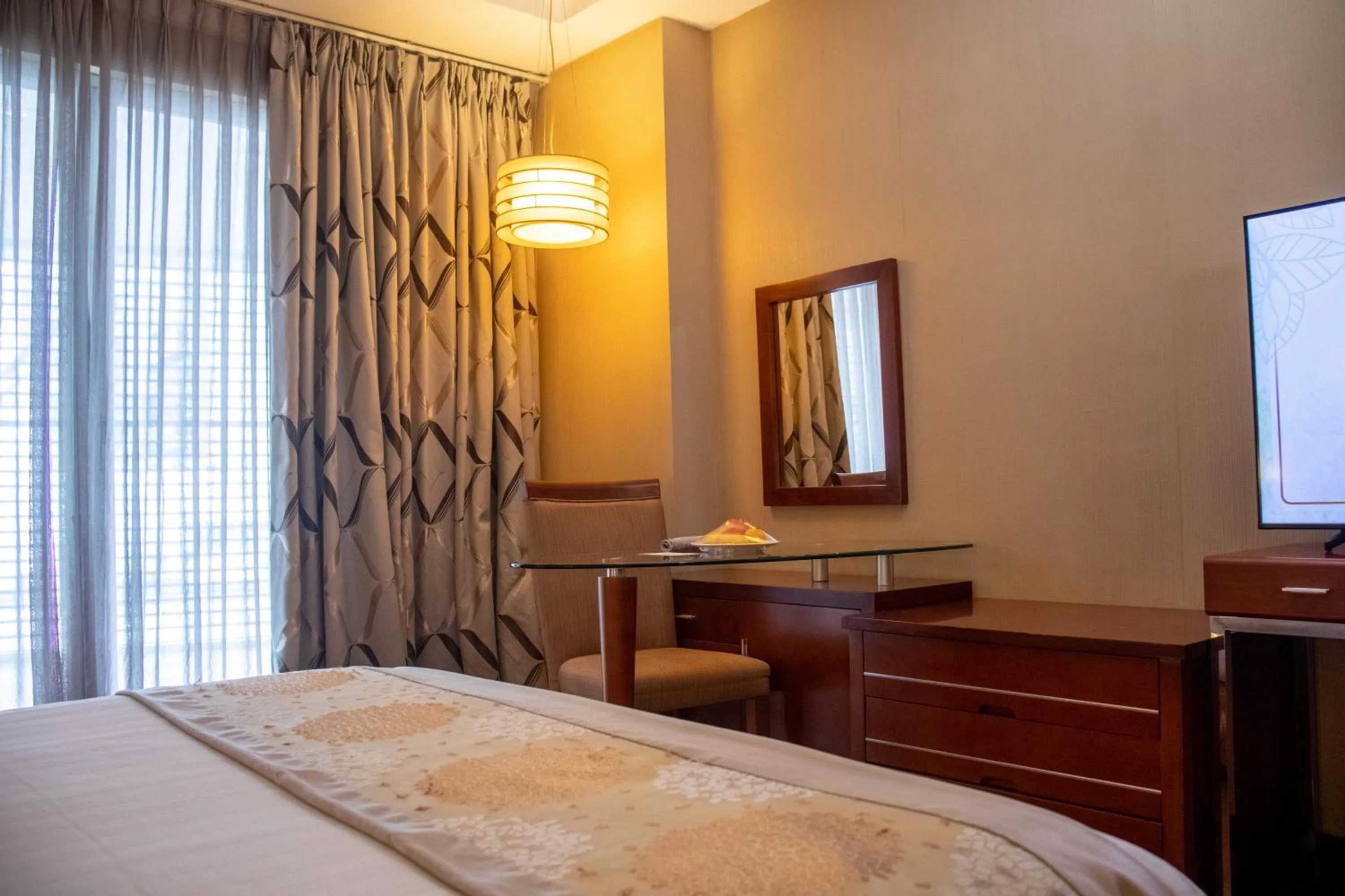 Bed in The Avenue Plaza Hotel