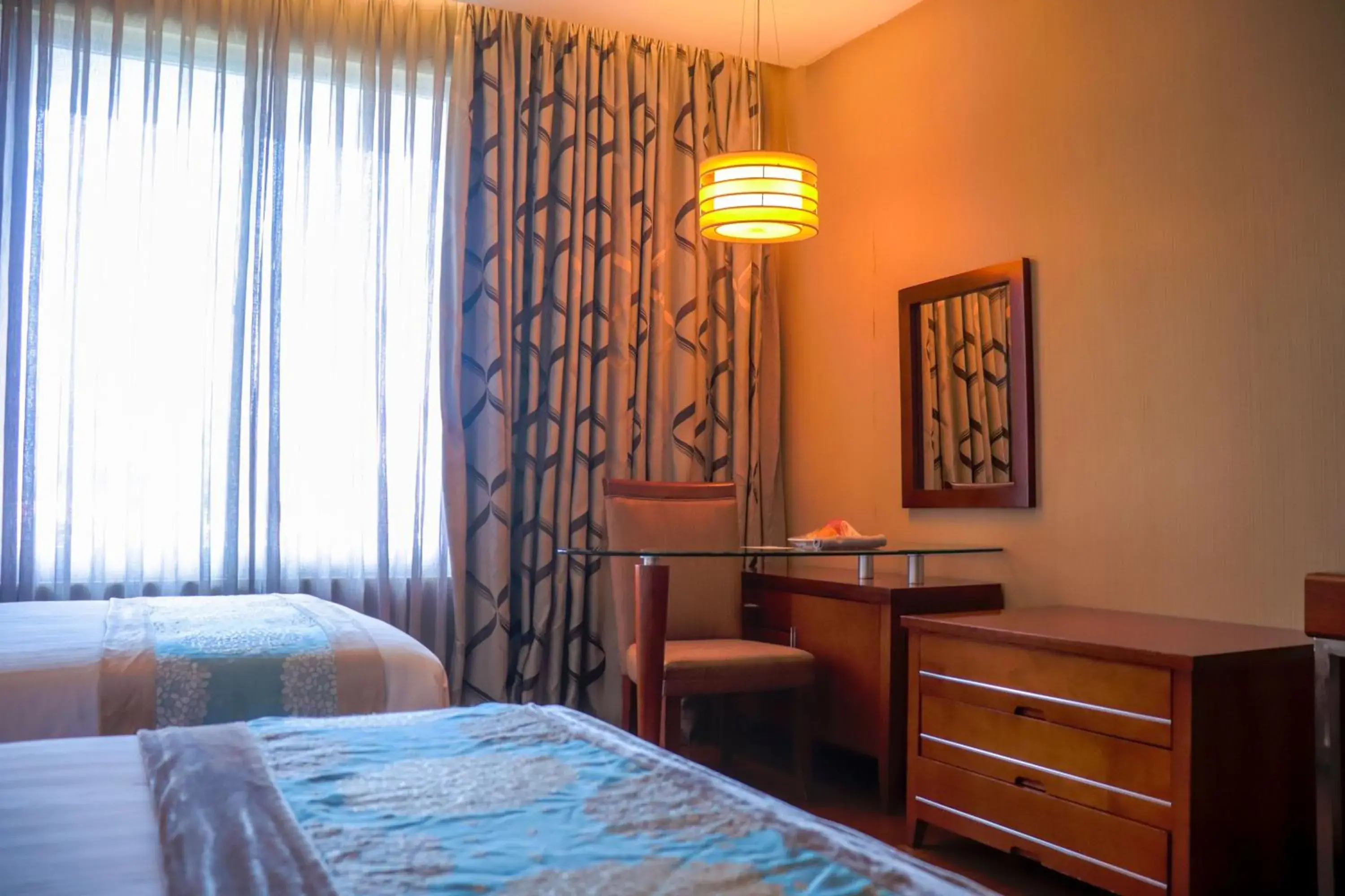 Bed in The Avenue Plaza Hotel Bed in The Avenue Plaza Hotel