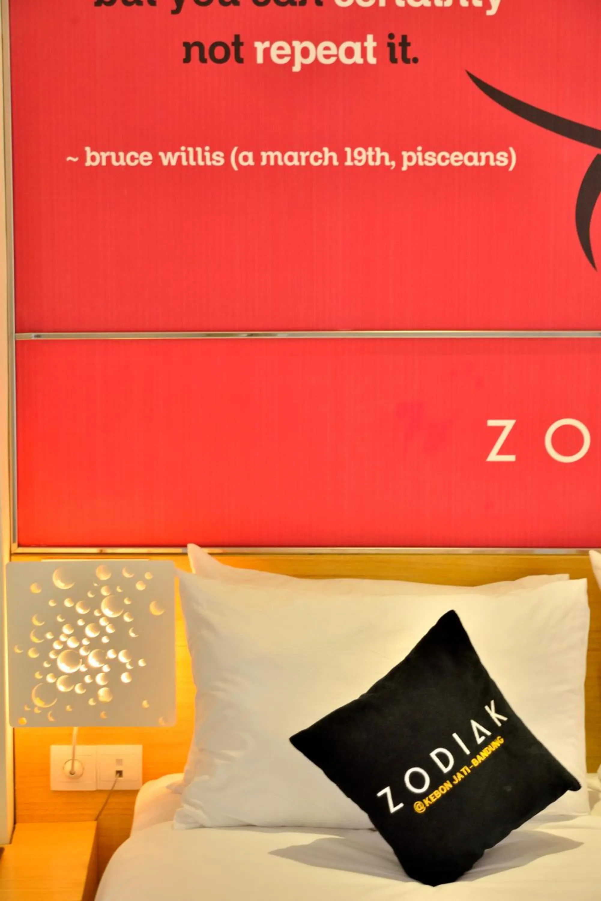 Bed in Zodiak at Kebon Jati Hotel