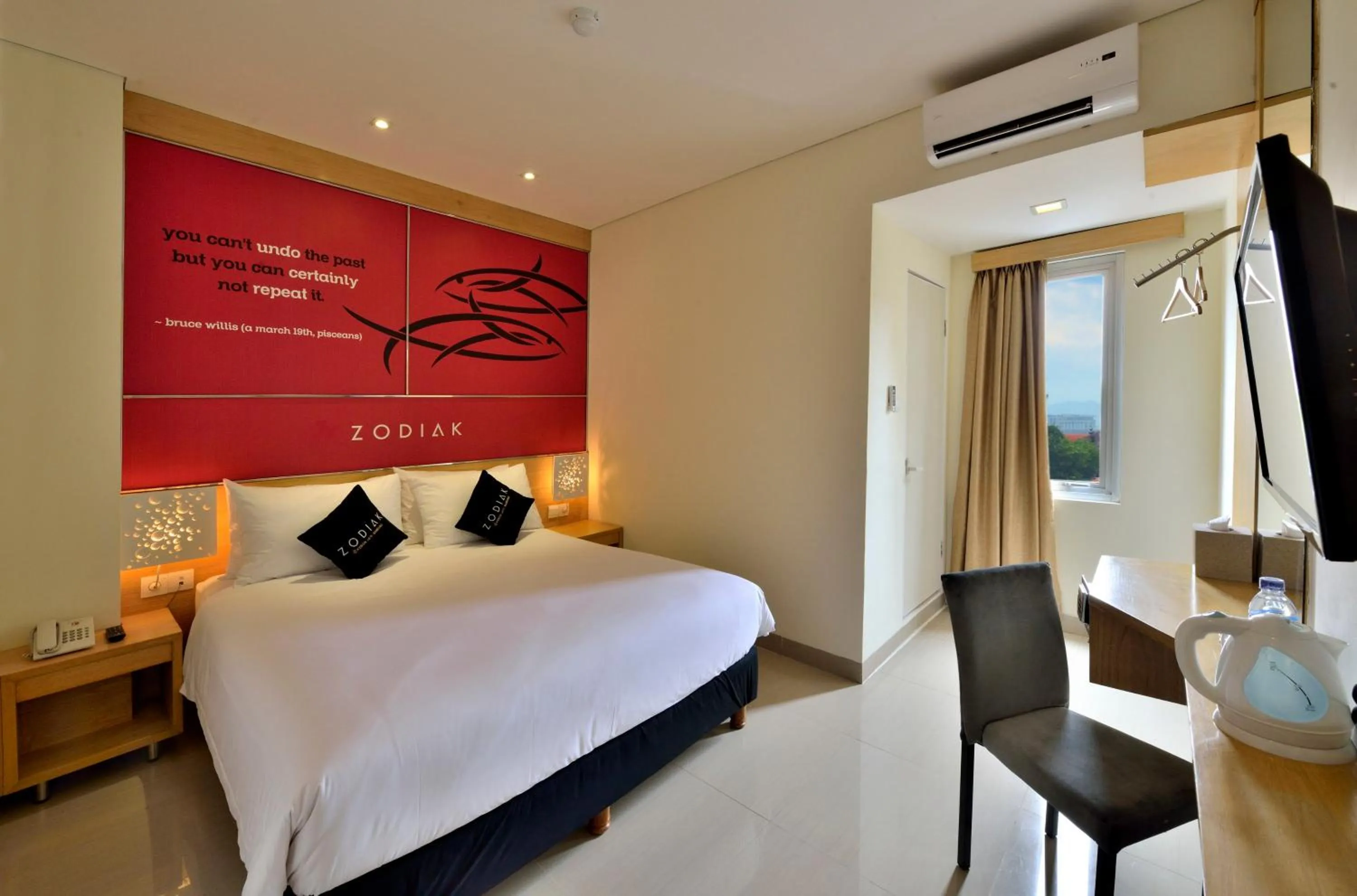 Bed in Zodiak at Kebon Jati Hotel