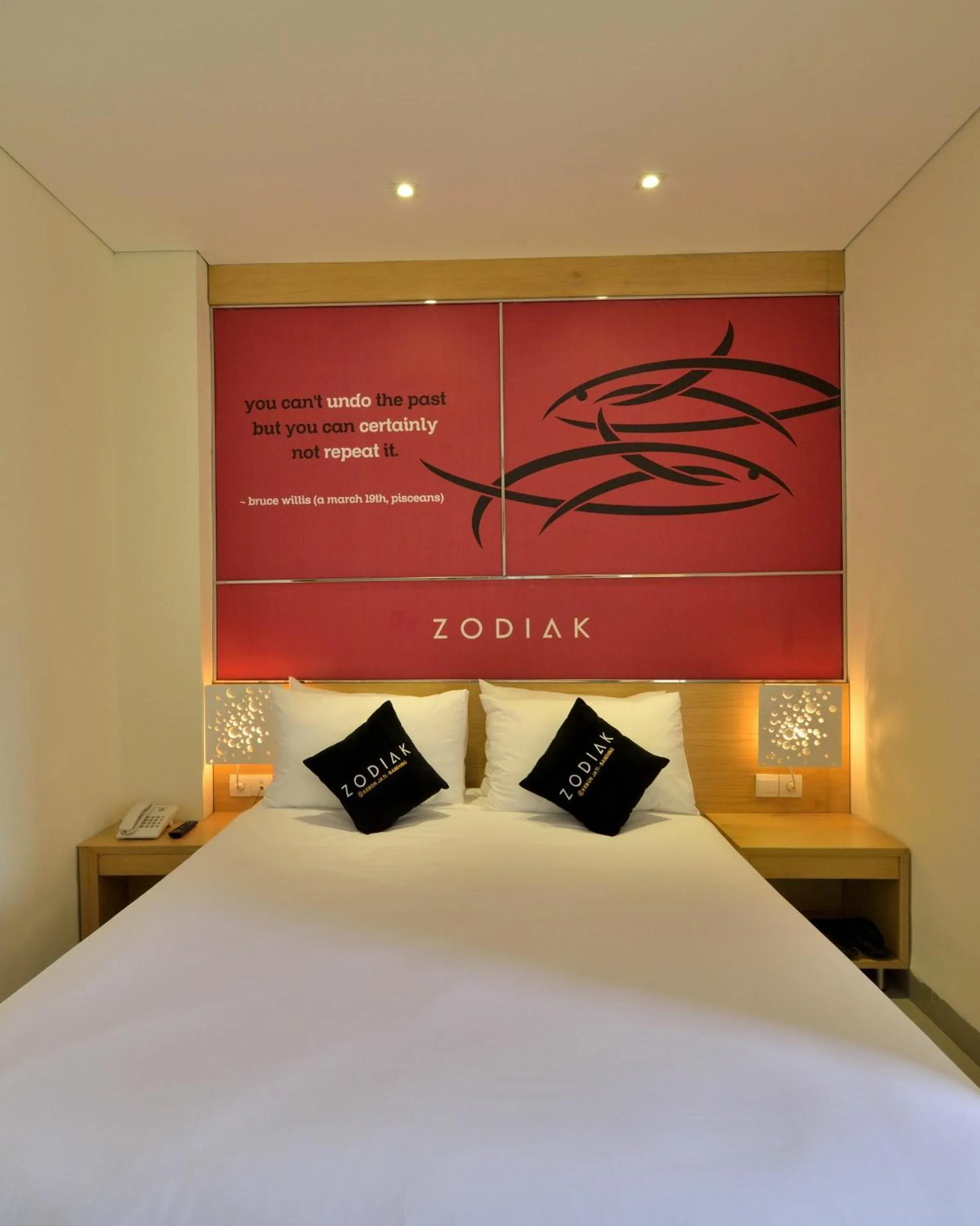 Bed in Zodiak at Kebon Jati Hotel