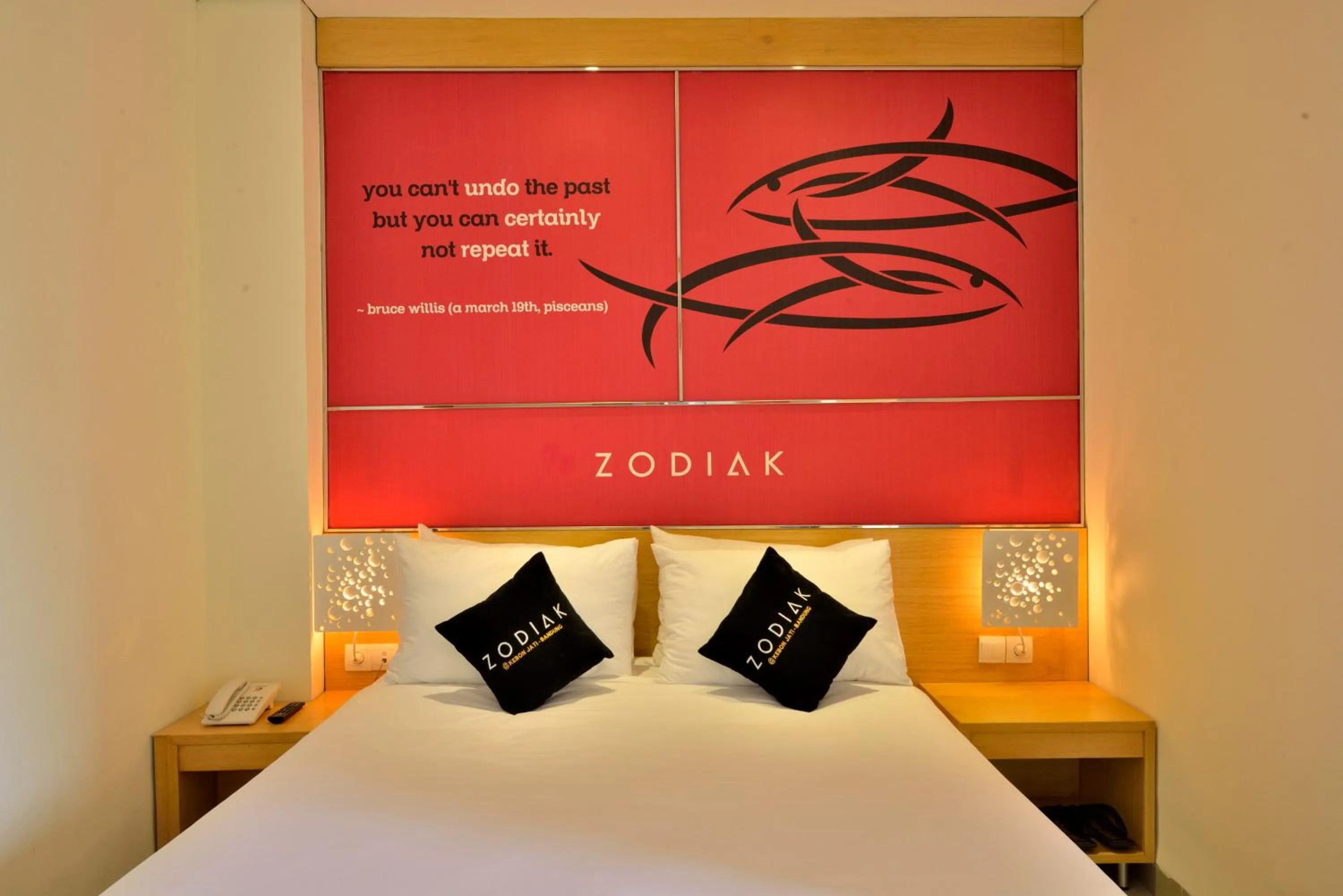 Bed in Zodiak at Kebon Jati Hotel