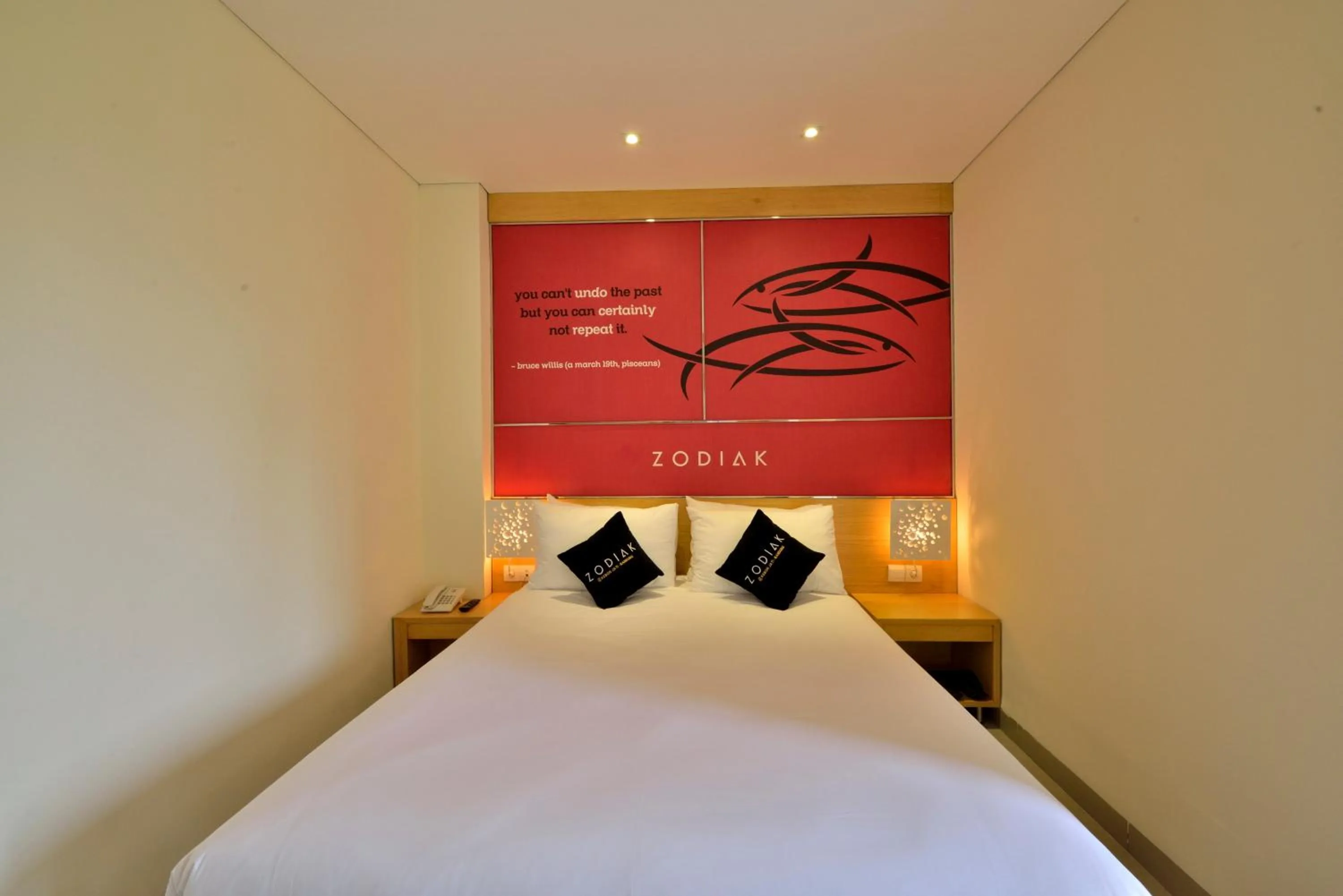 Bed in Zodiak at Kebon Jati Hotel