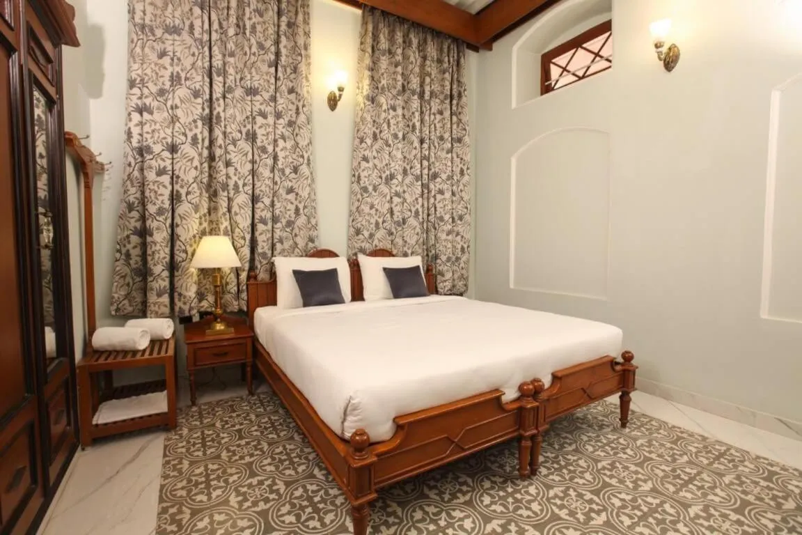 Bed in Taj Mahal Hotel Abids