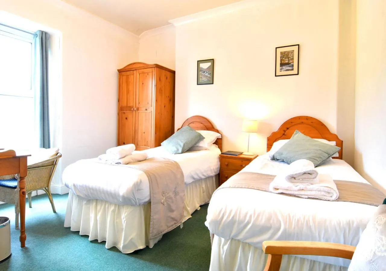 Bed in Brook House Inn