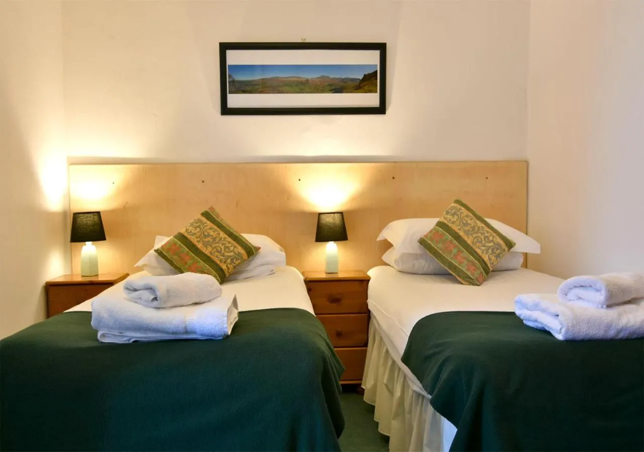 Bed in Brook House Inn