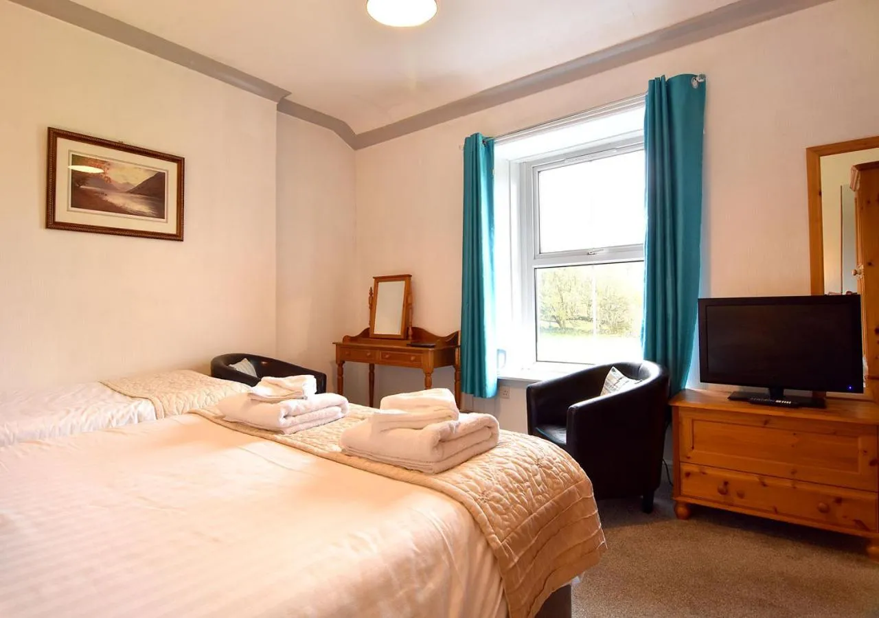 Bed in Brook House Inn
