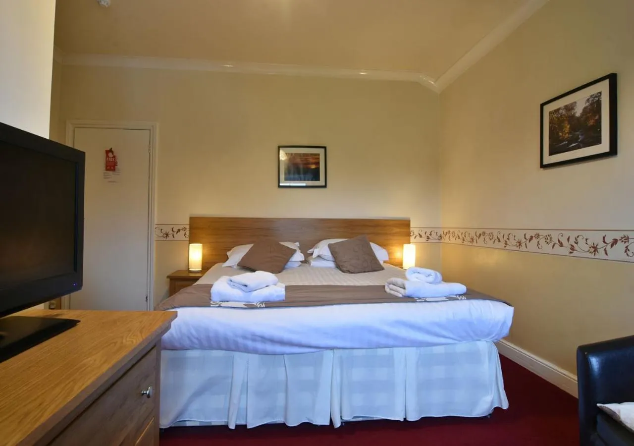 Bed in Brook House Inn