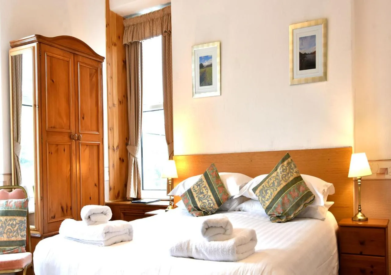 Bed in Brook House Inn