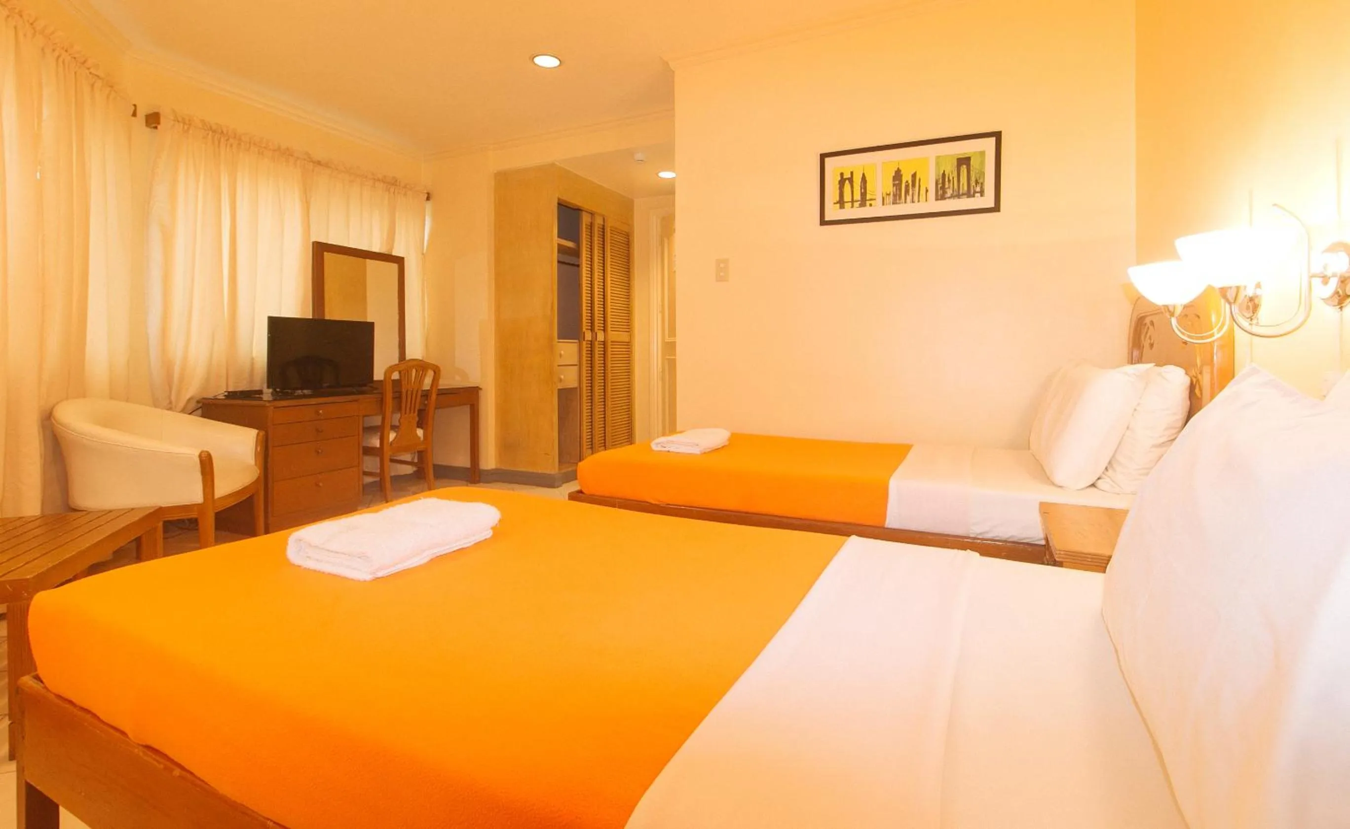 Bedroom, Bed in Royal Am Rei Hotel by RedDoorz