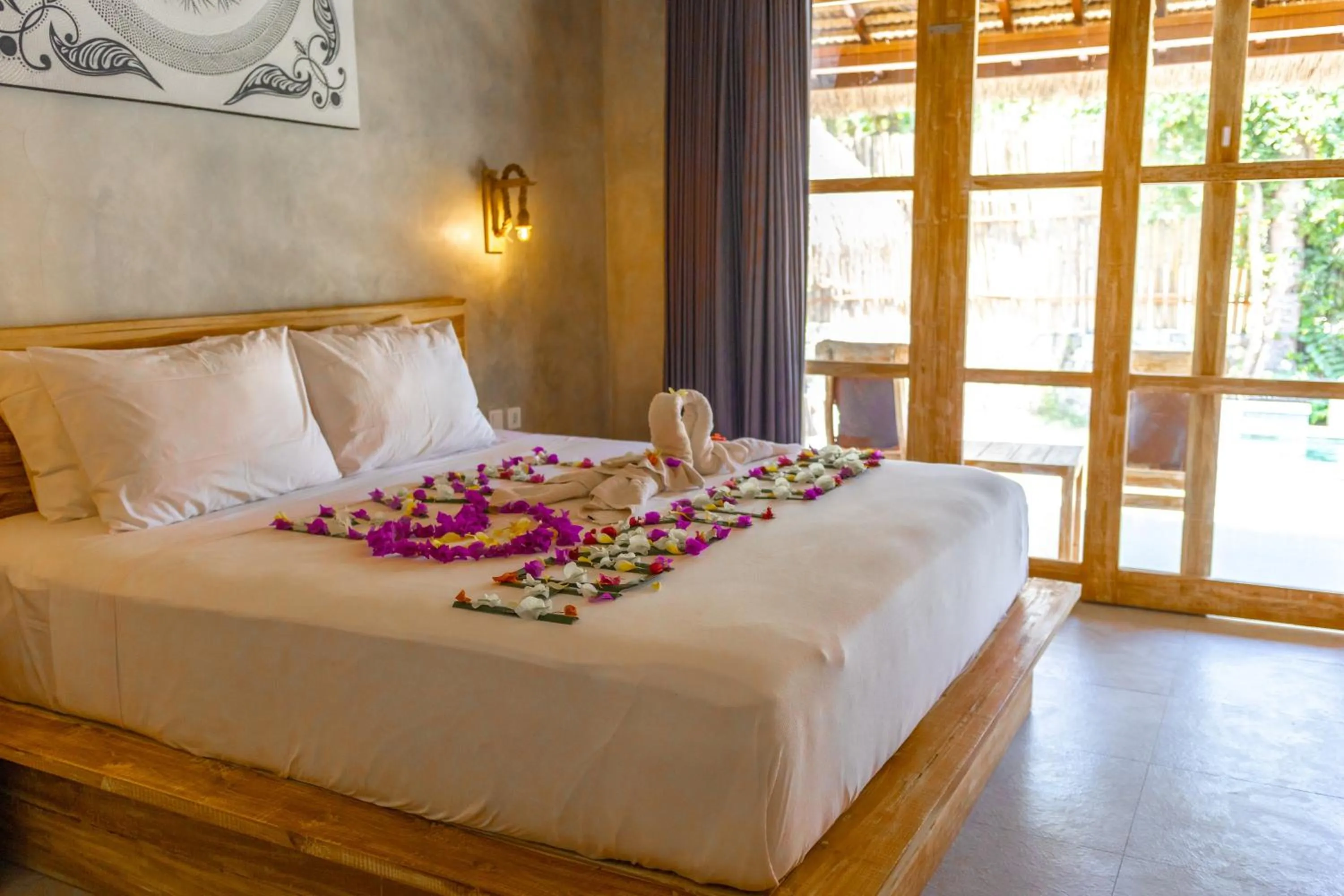 Bed in Golden Garuda Cottages
