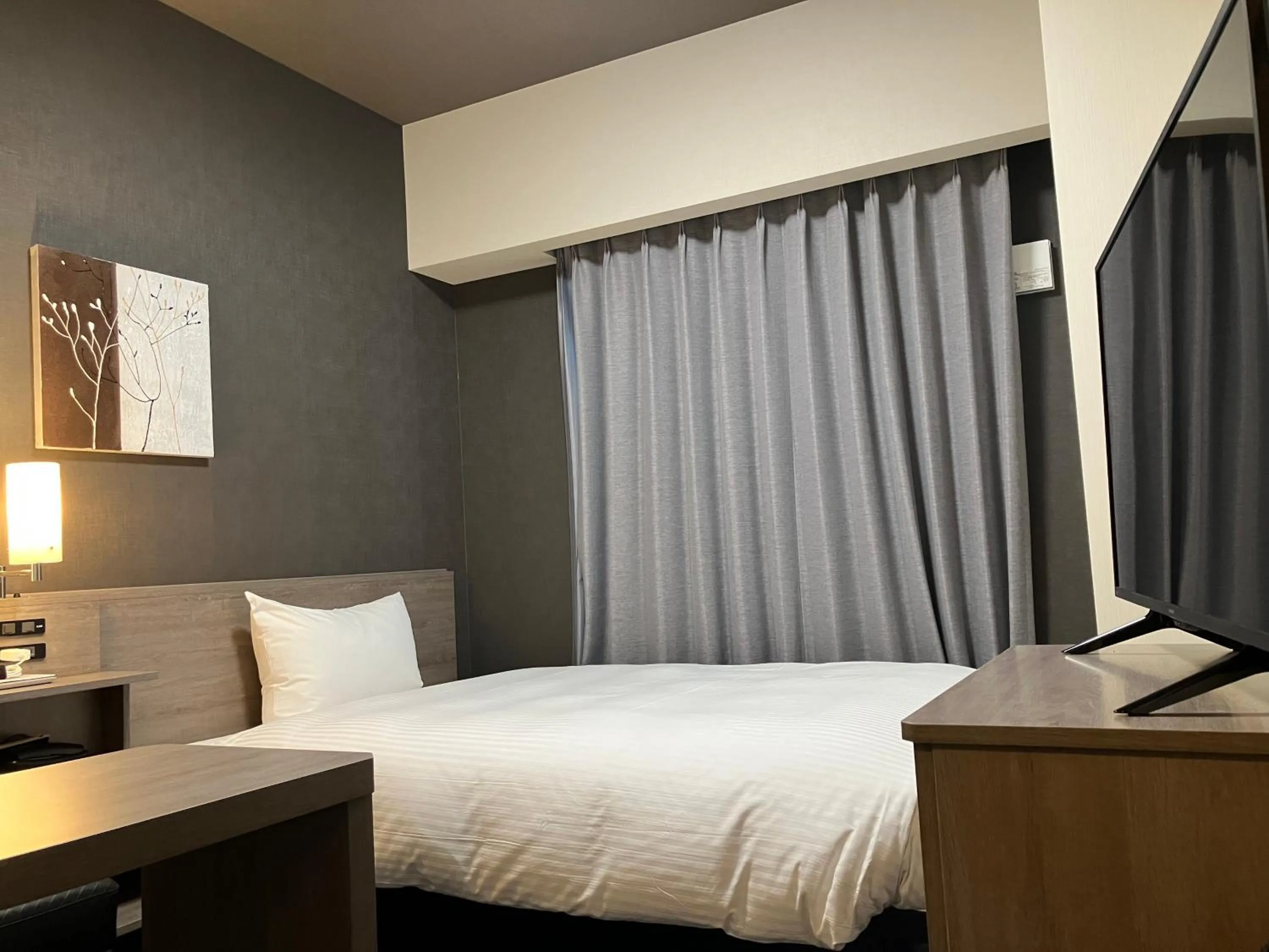 Photo of the whole room, Bed in Hotel Route Inn Shikoku Chuo