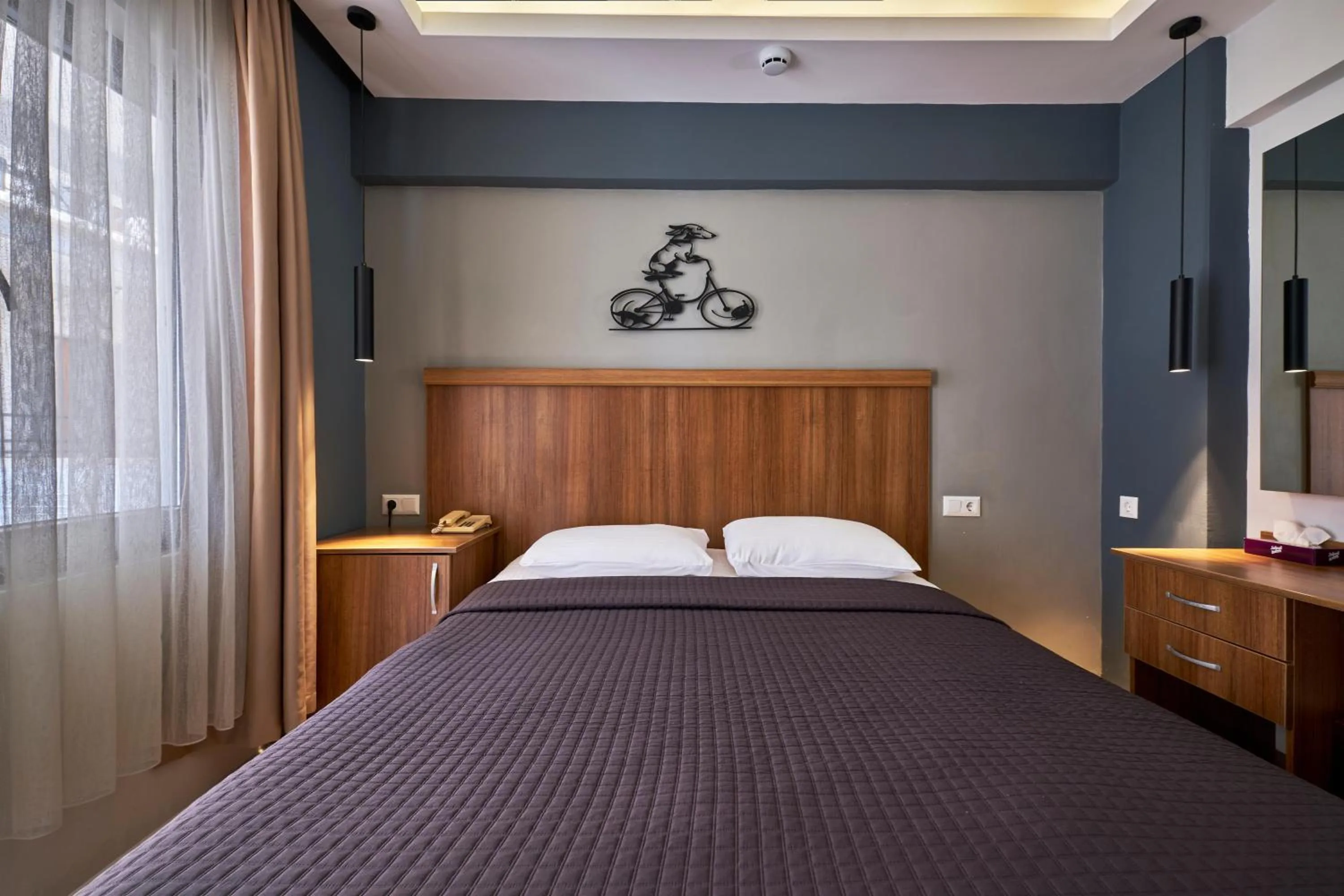 Bed in Aqua Princess Hotel