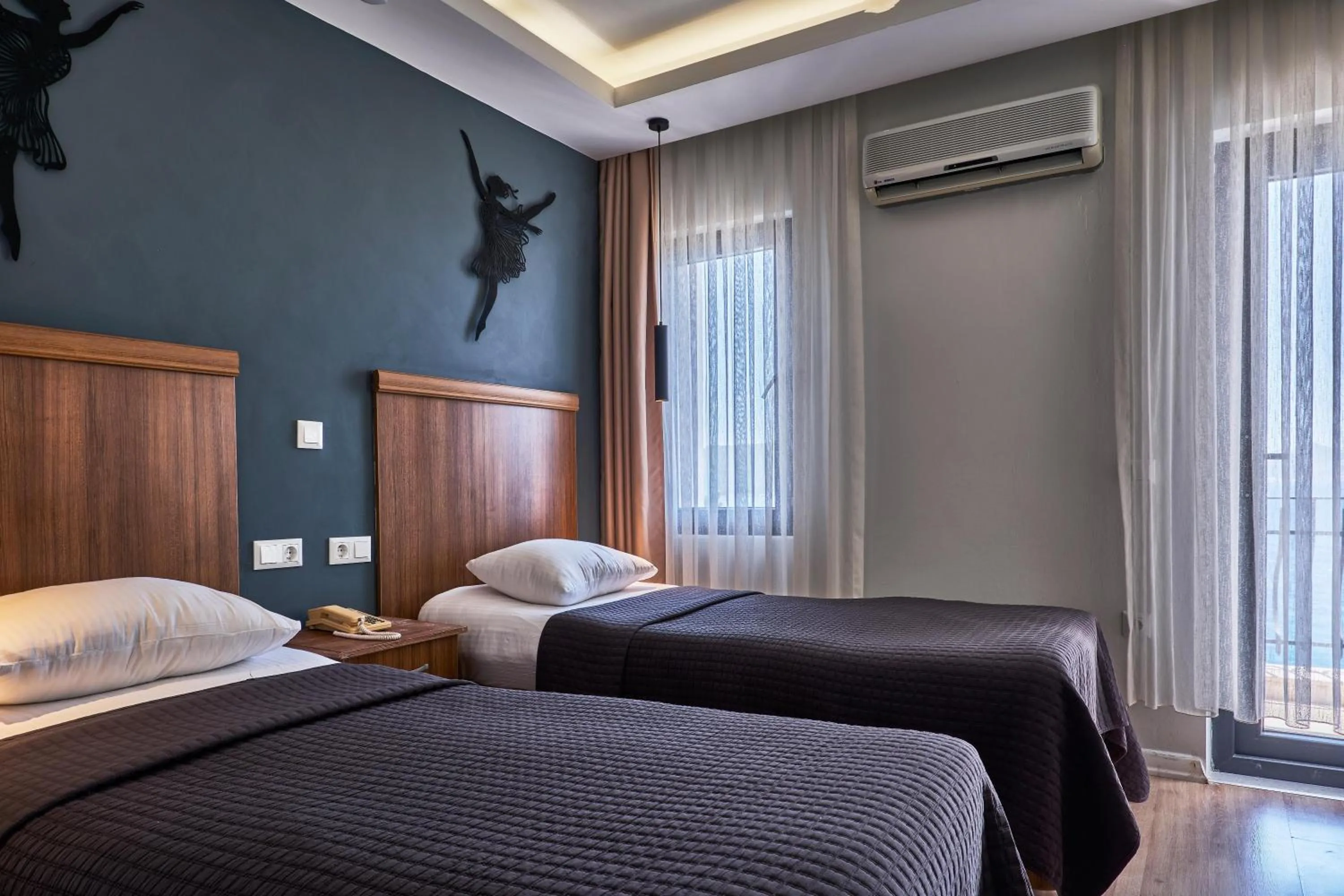 Photo of the whole room, Bed in Aqua Princess Hotel