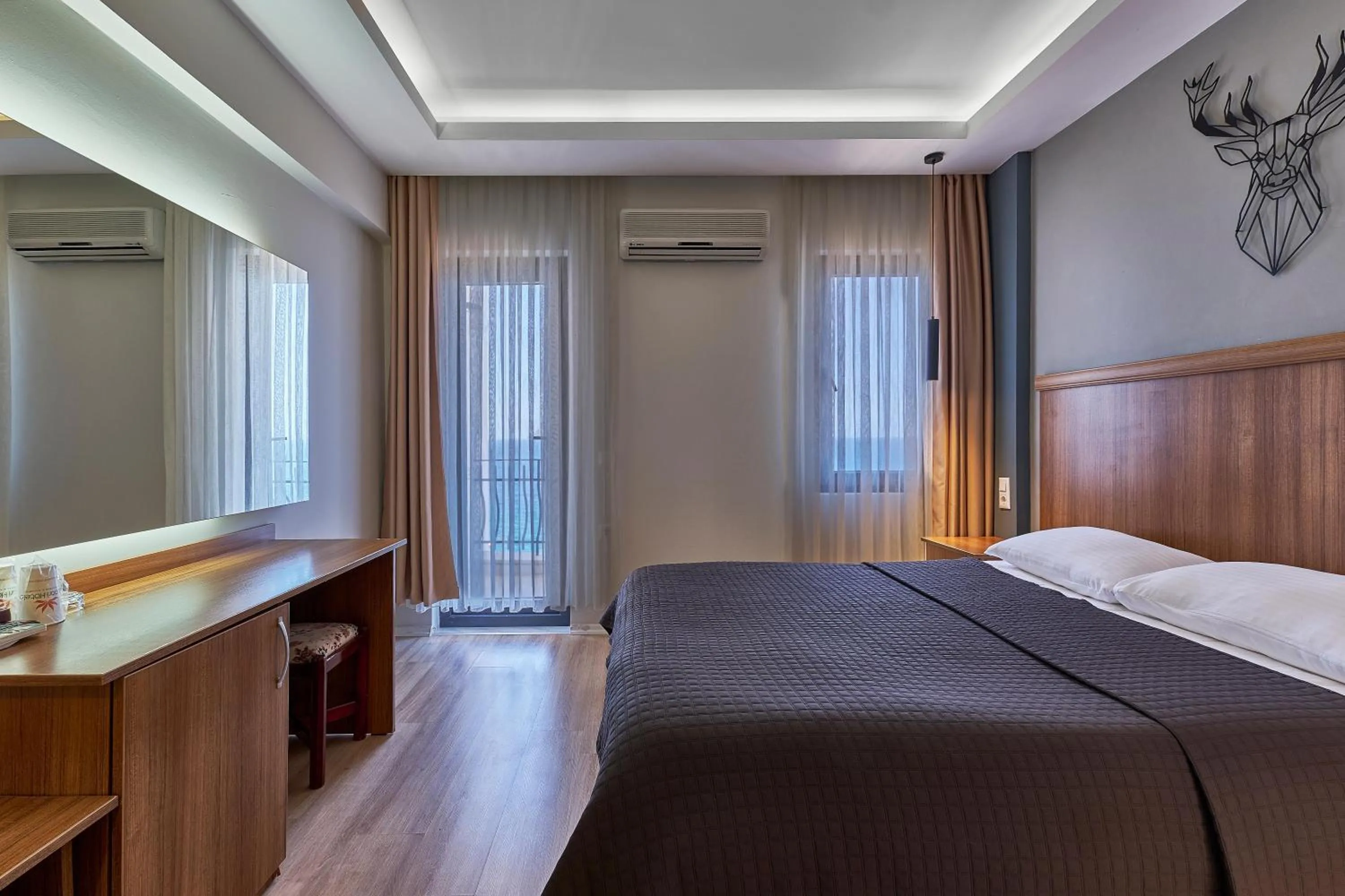 Photo of the whole room, Bed in Aqua Princess Hotel