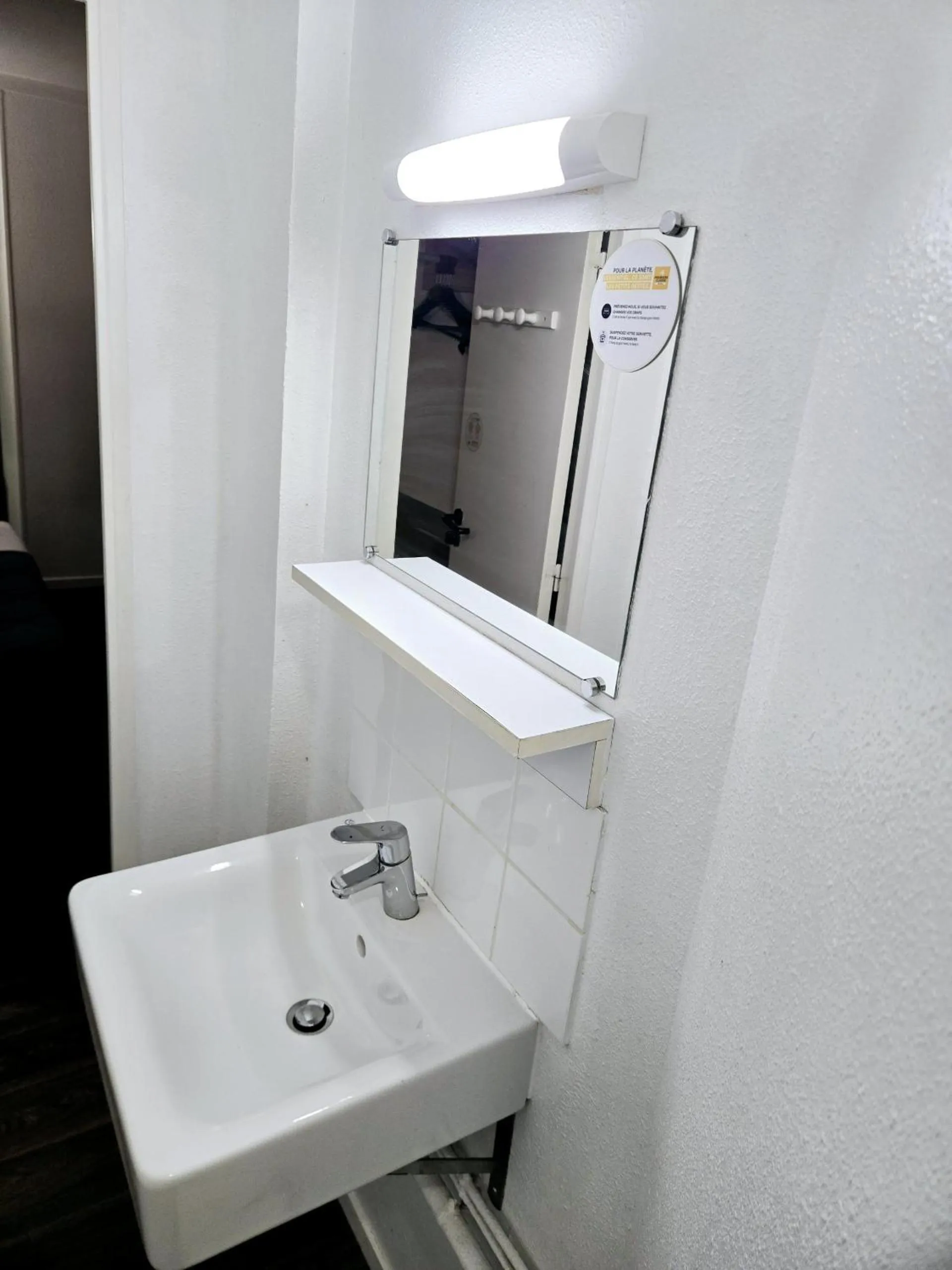 Bathroom in PREMIERE CLASSE ANGERS SUD Louvre Hotels group