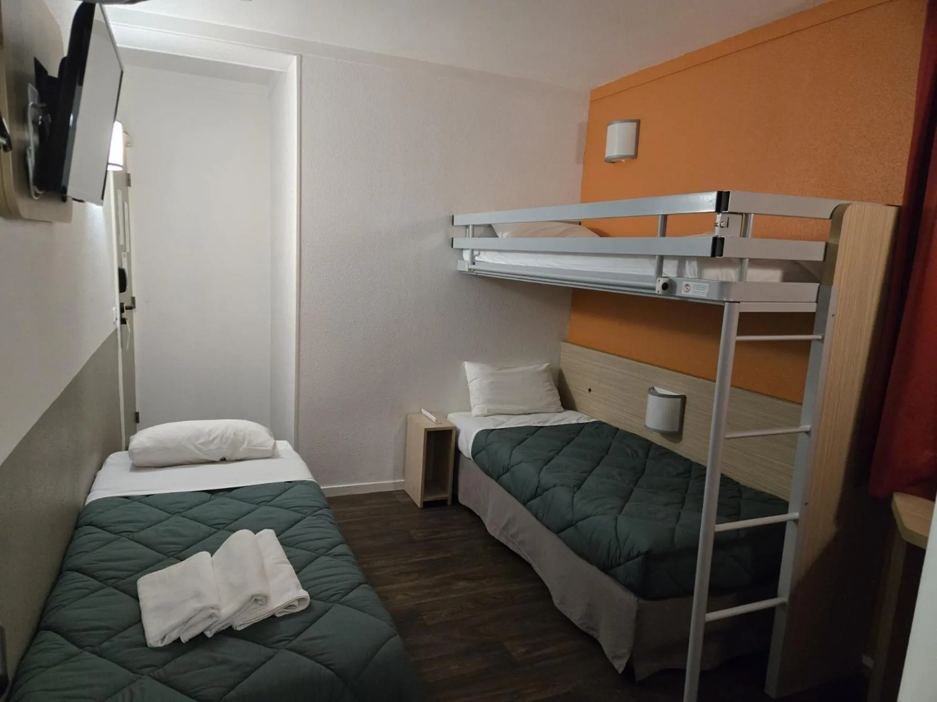 Bedroom, Bed in PREMIERE CLASSE ANGERS SUD Louvre Hotels group