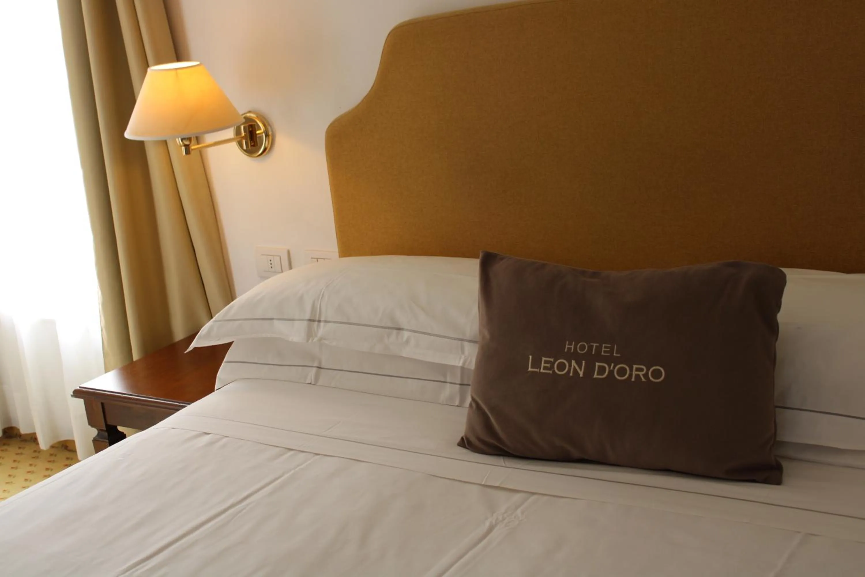 Bedroom, Bed in Cora Hotels Leon d'Oro