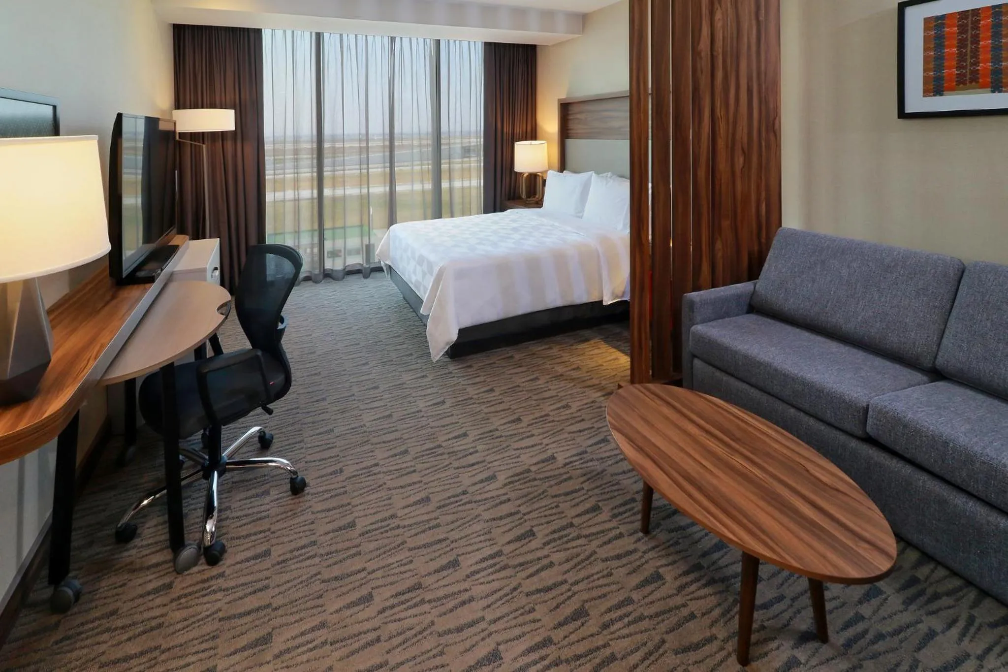 Photo of the whole room, Bed in Holiday Inn & Suites - Mexico Felipe Angeles Airport by IHG