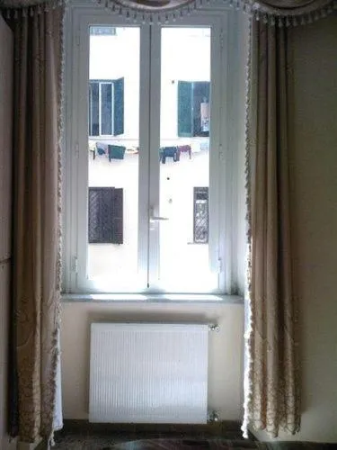 Bedroom in Roma Prince Inn accommodation