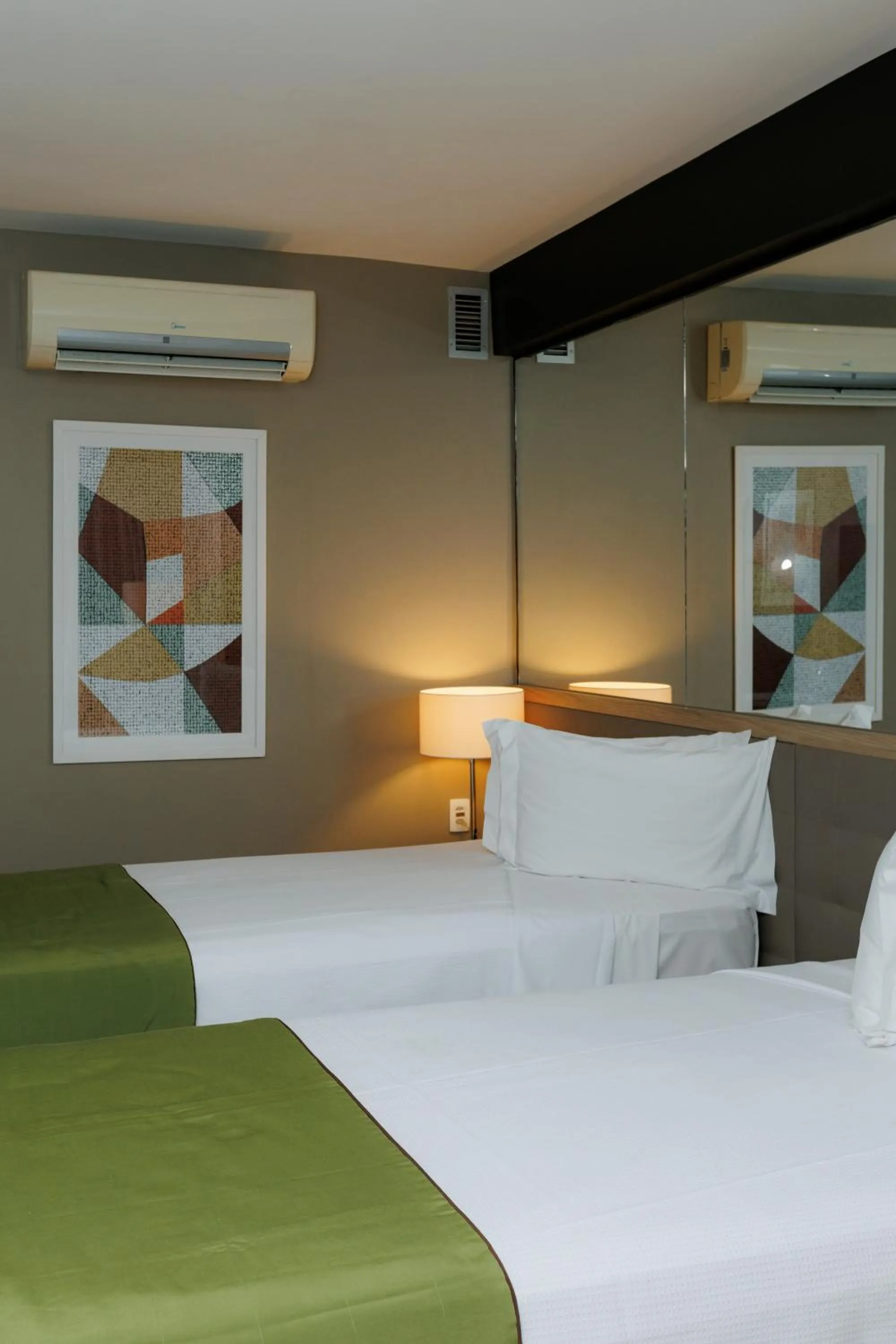 Bed in eSuites Savassi Toscanini