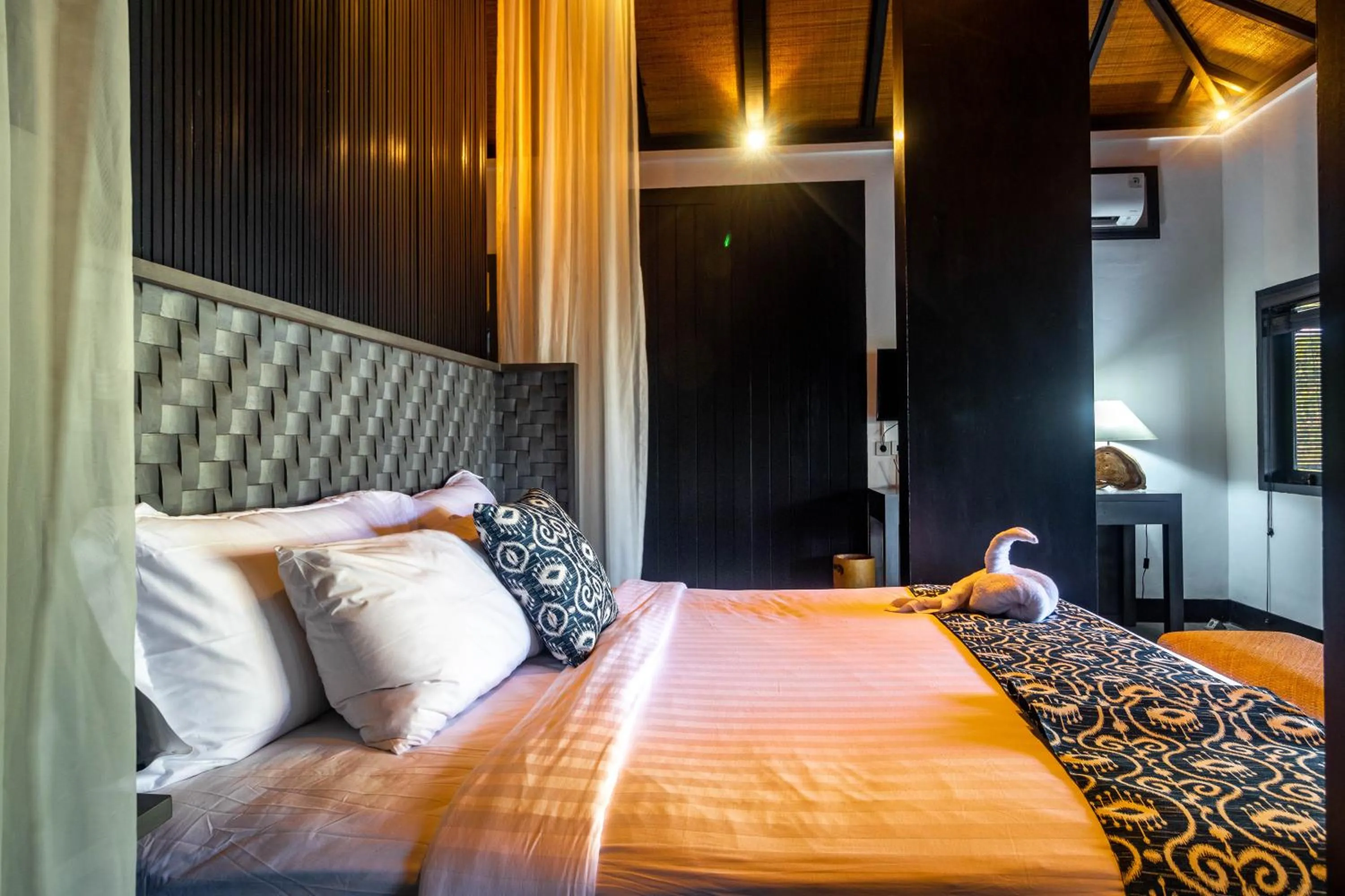 Bed in Surya Melasti Beach Villa