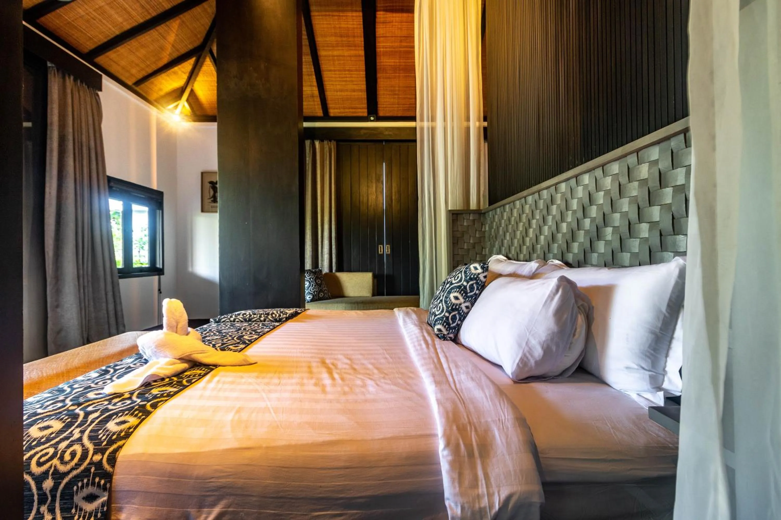 Bed in Surya Melasti Beach Villa
