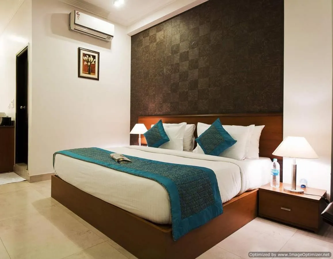 Bed in Asian Suites IFFCO Metro Station Gurugram