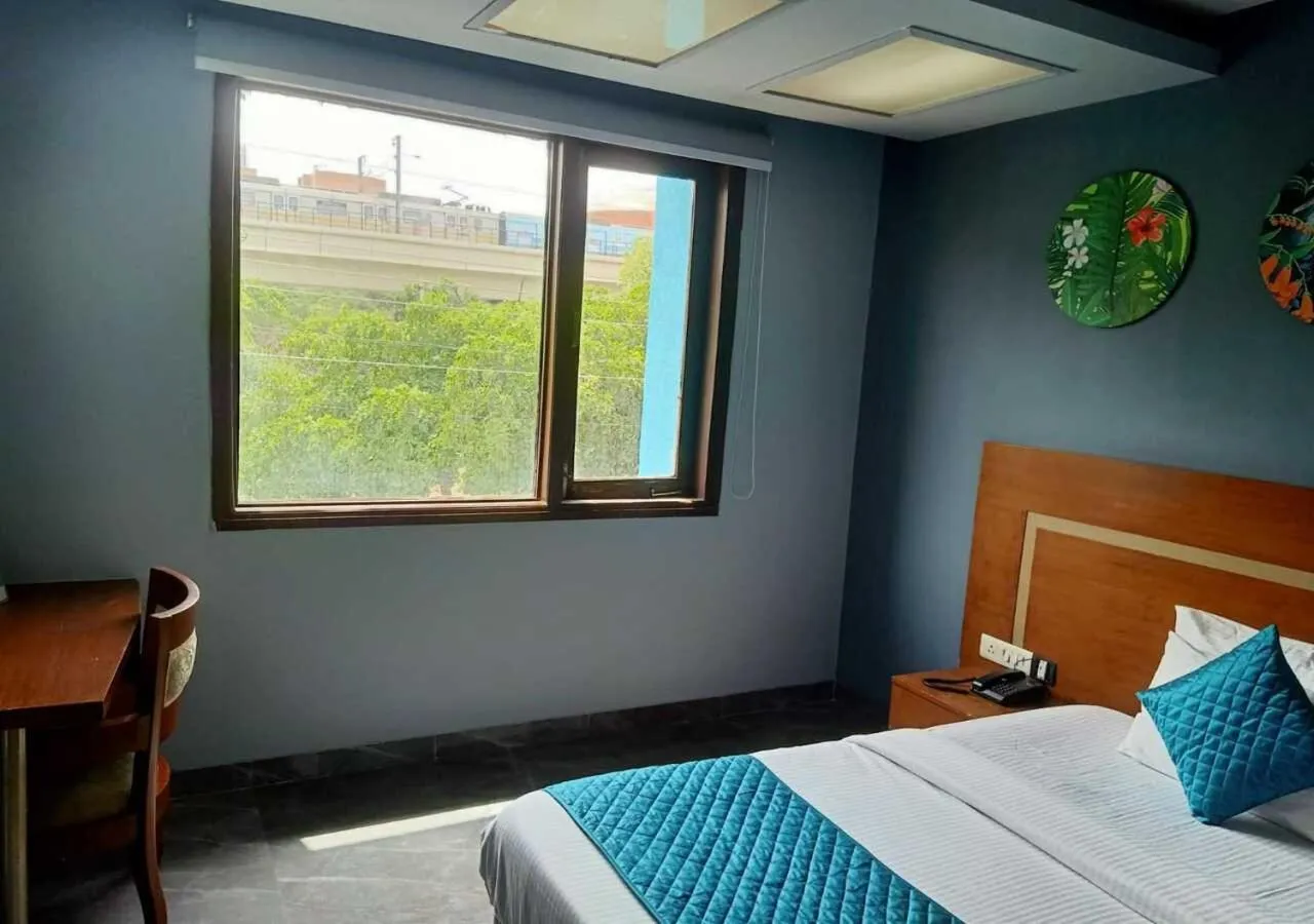 Photo of the whole room, Bed in Asian Suites IFFCO Metro Station Gurugram