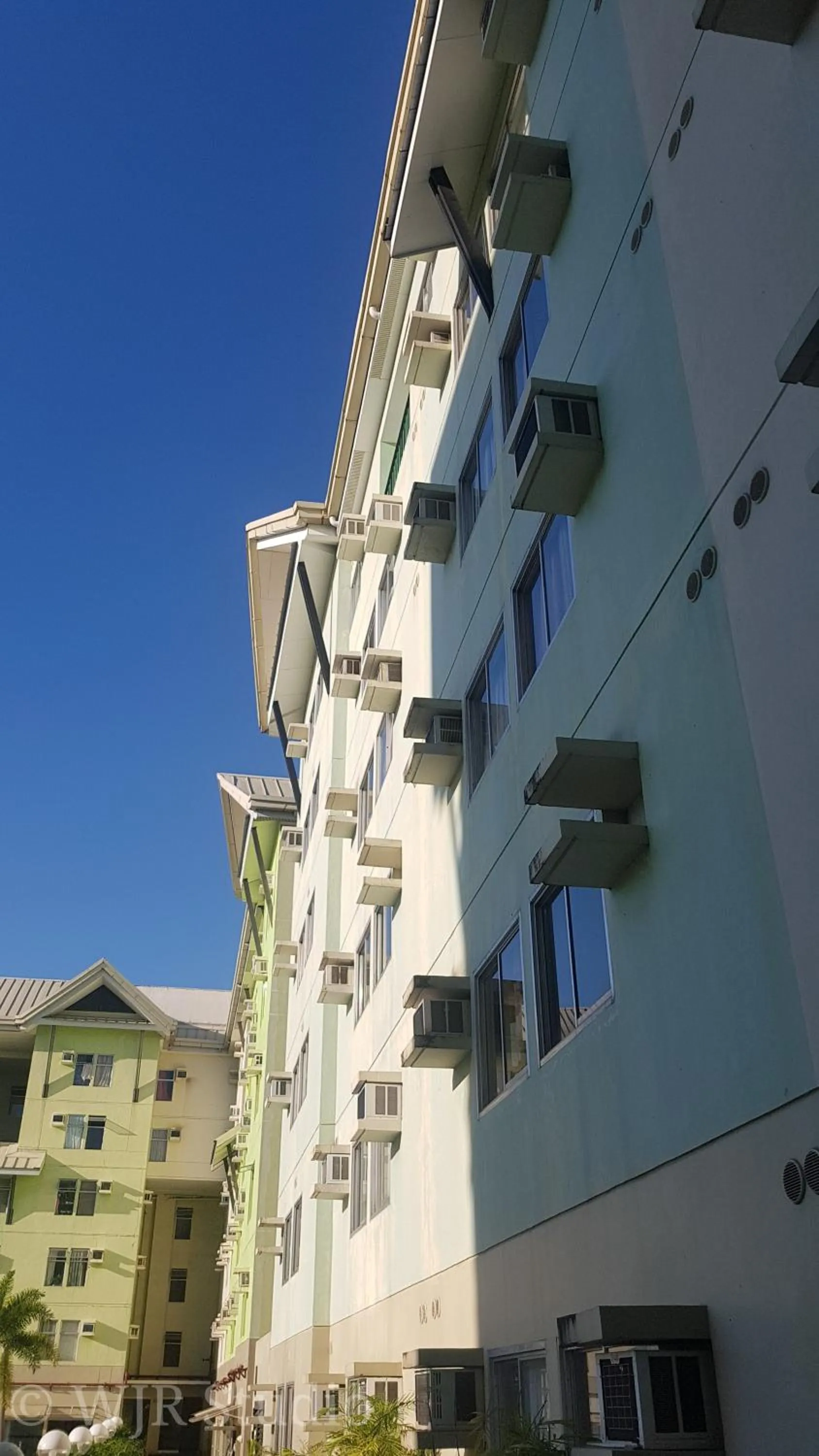 Property building in Centropolis Queen Bed Suite- Modern Posh Style