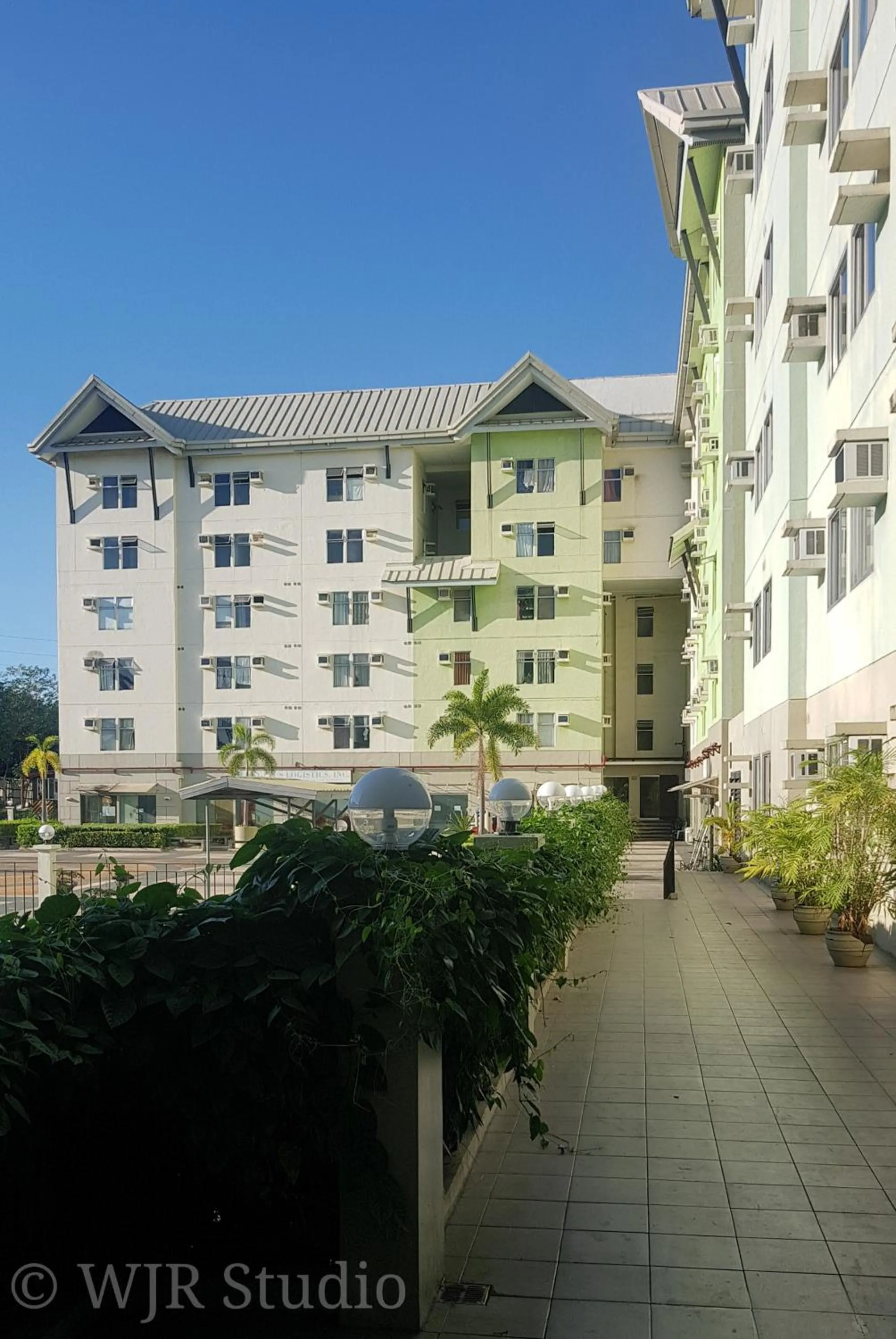 Property building in Centropolis Queen Bed Suite- Modern Posh Style
