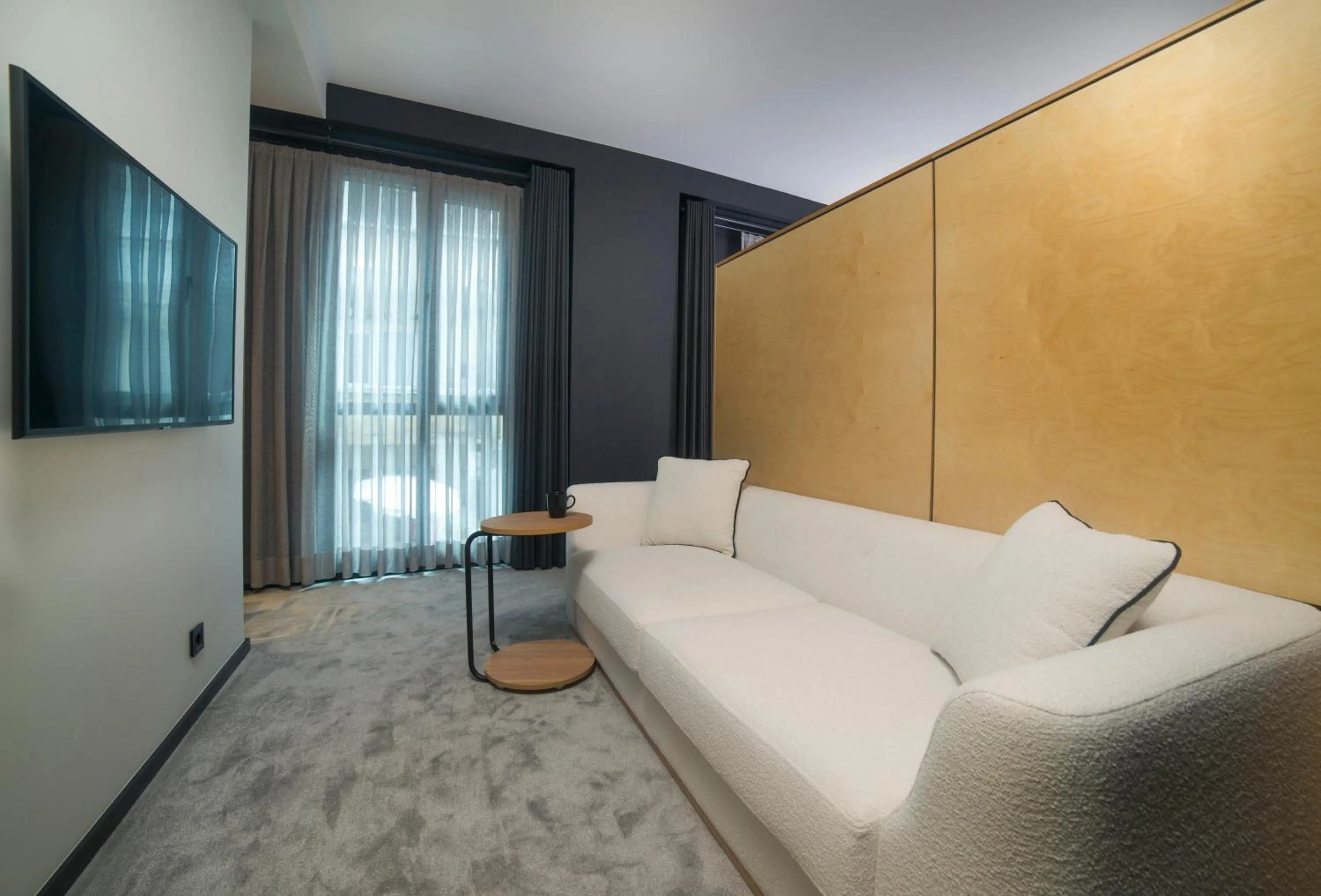 Living room, Bed in Trip Park Hotel