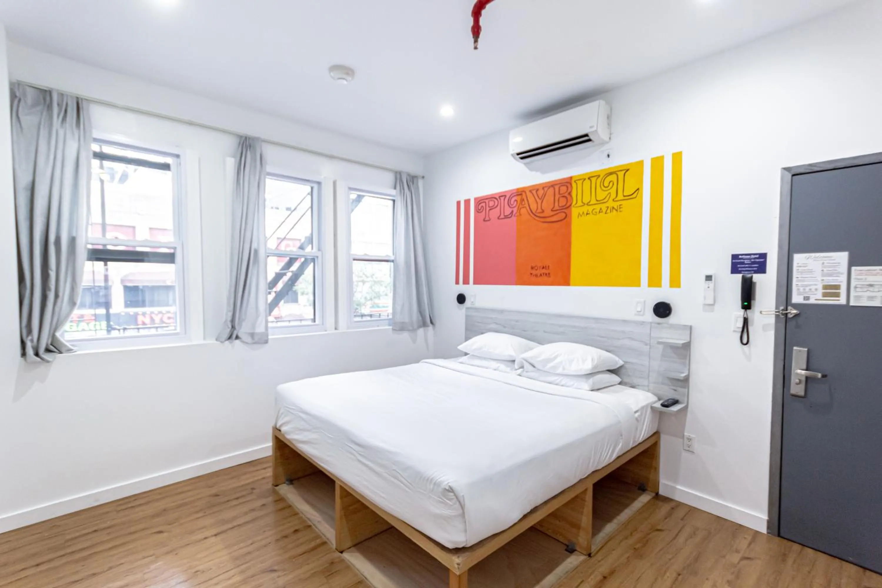 Bed in JG Times SQ Hotel by JGSTAY