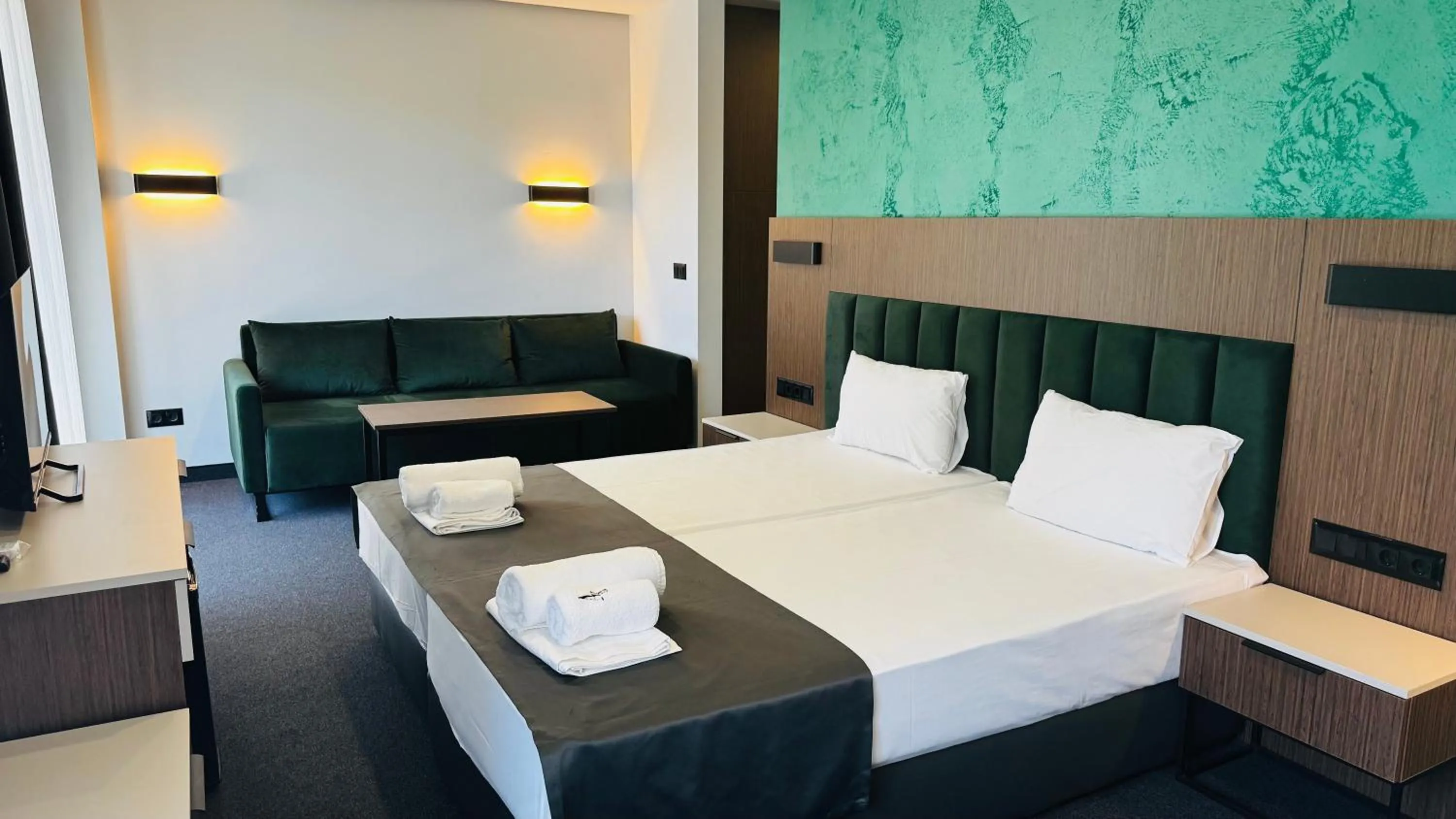 Bed in Atliman Beach Park Hotel