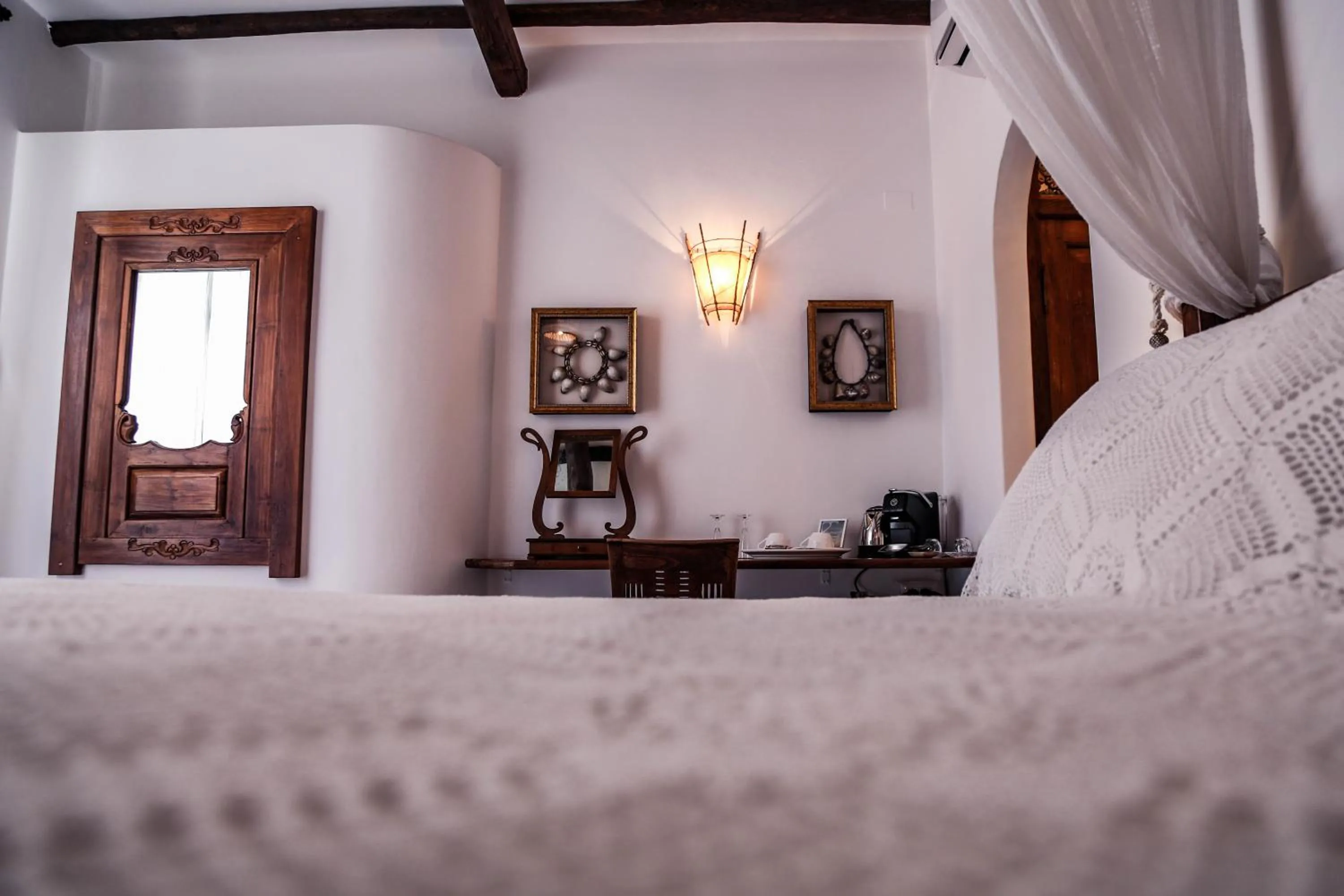 Bed in Quartara Boutique Hotel